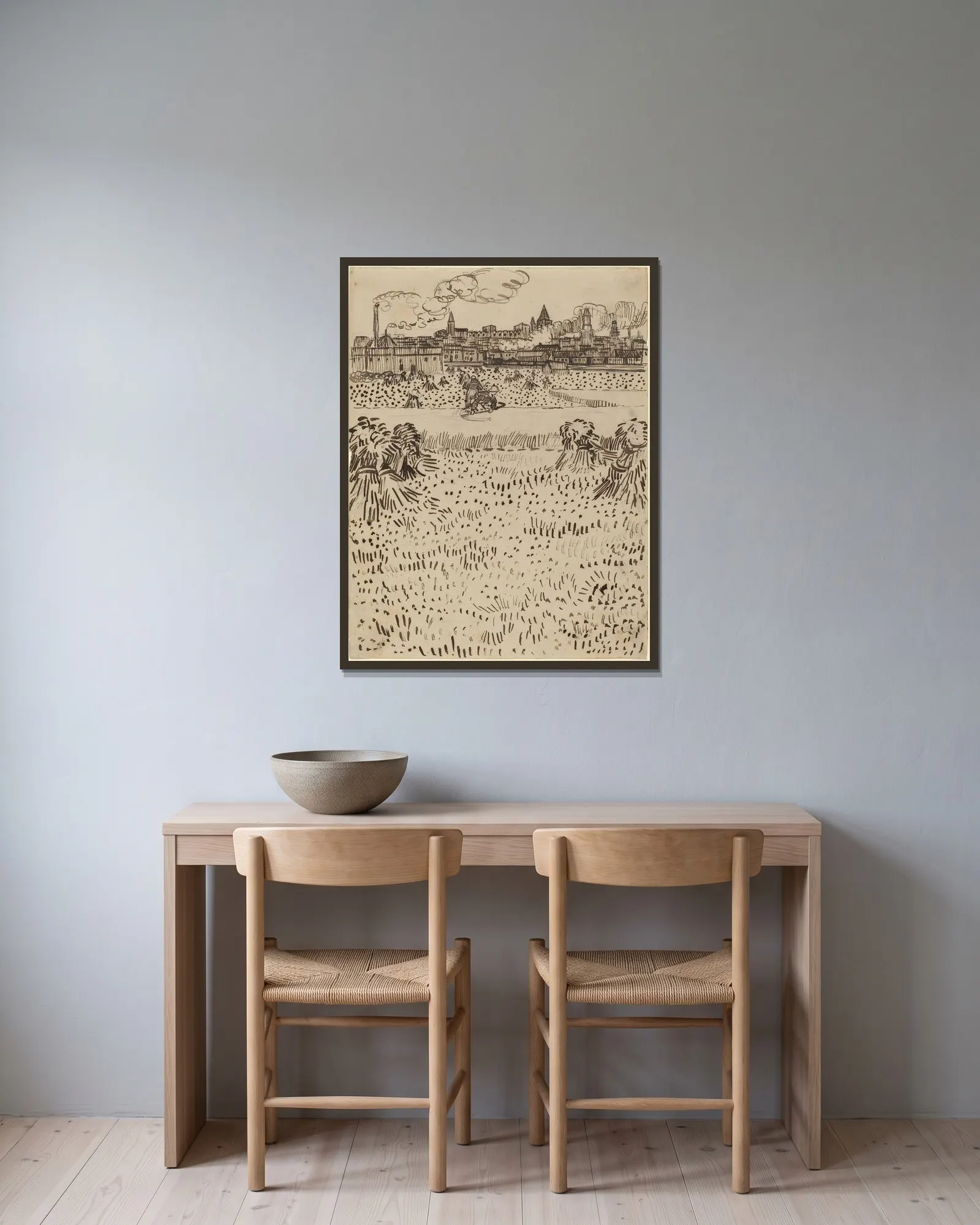 The Harvest av Vincent van Gogh inramad på en vägg