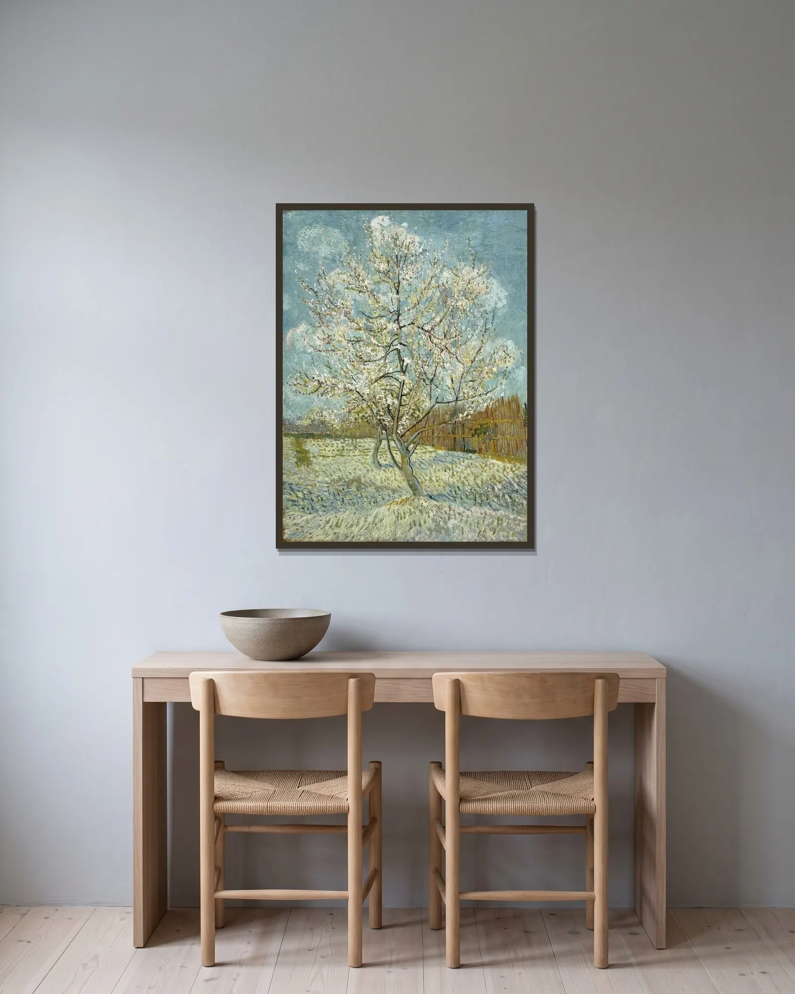 The pink peach tree av Vincent van Gogh inramad på en vägg