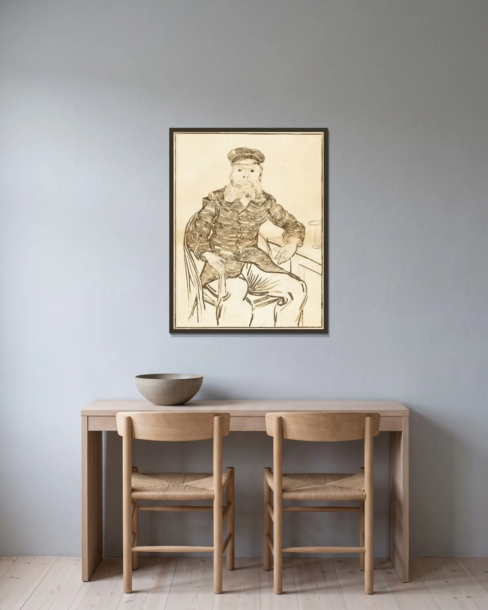 The Postman Joseph Roulin av Vincent van Gogh inramad på en vägg