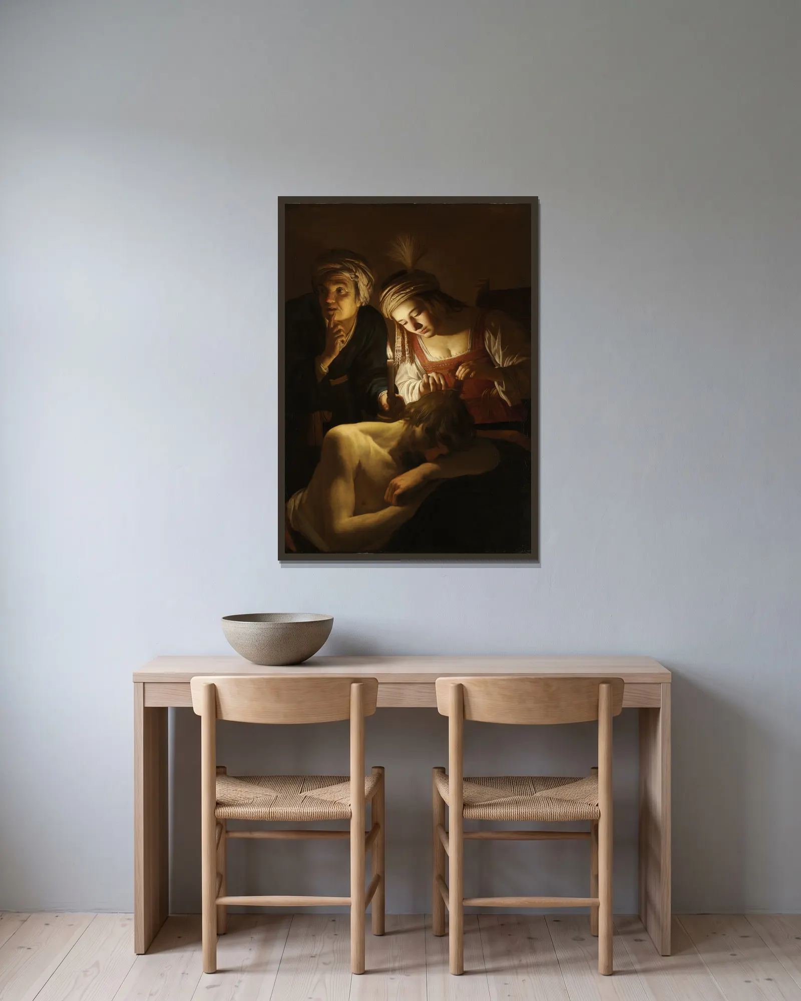 Samson and Delilah av Gerard van Honthorst inramad på en vägg