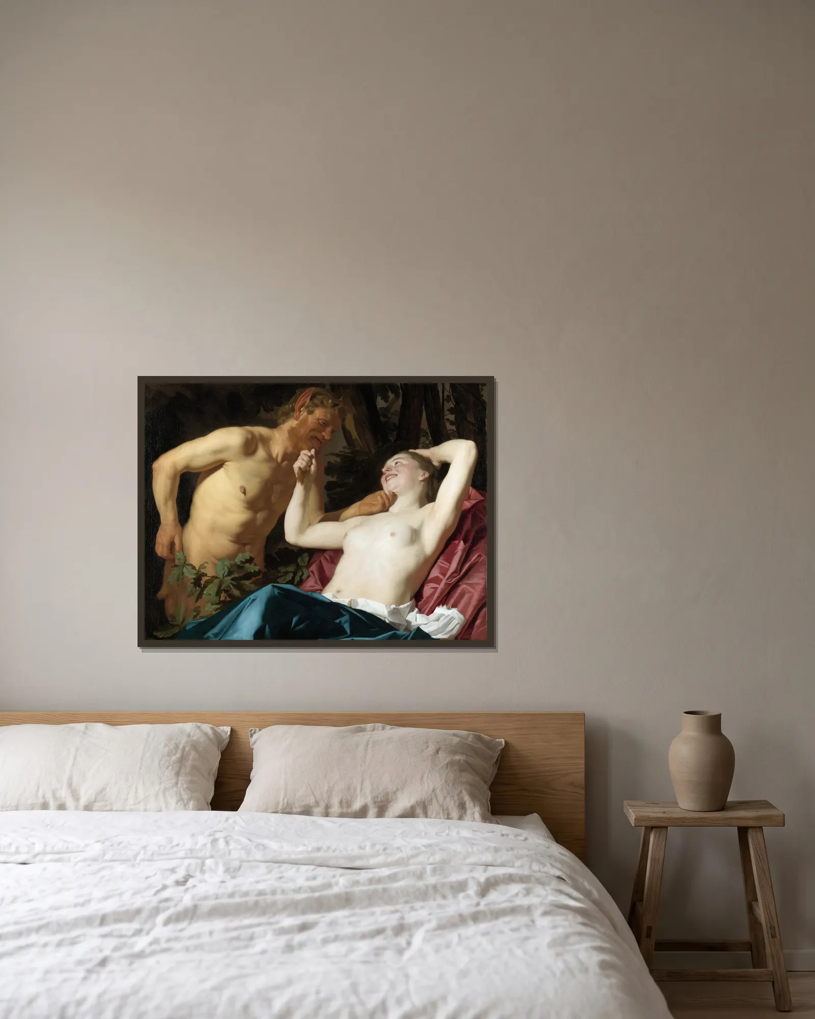 Satyr and Nymph av Gerard van Honthorst inramad på en vägg