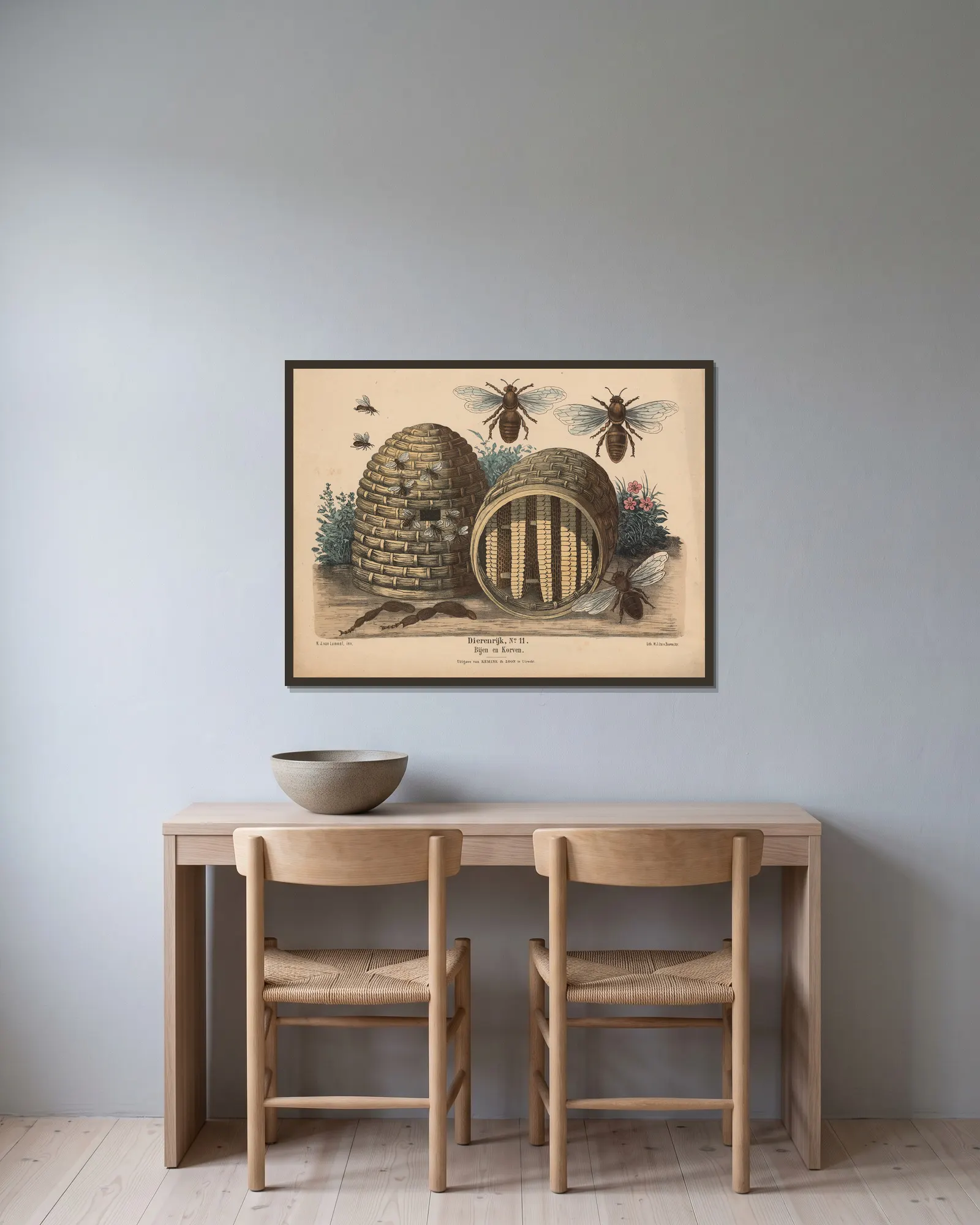 Bijen en Korven av Hendrik Jan van Lummel inramad på en vägg