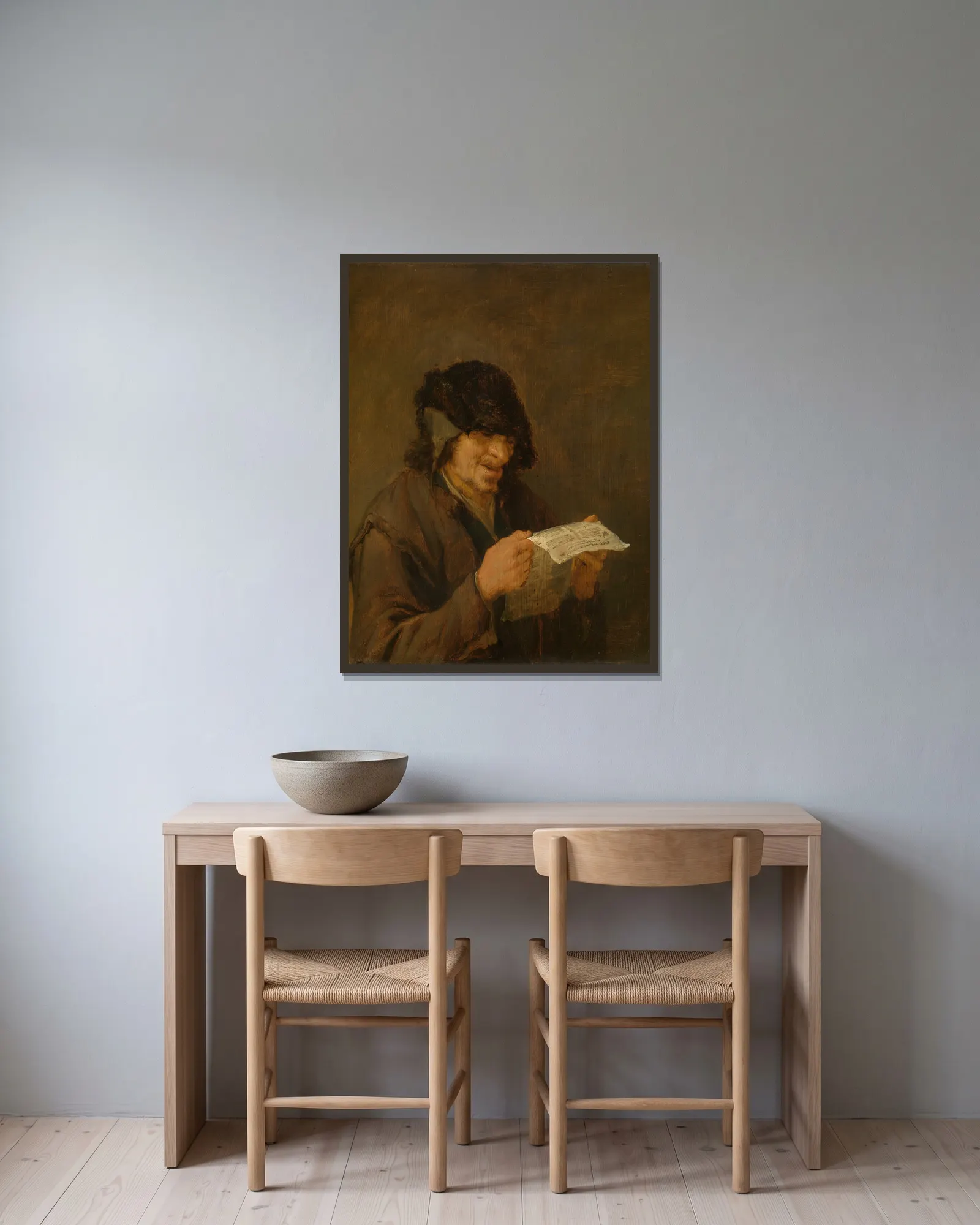 Man Singing av Adriaen van Ostade inramad på en vägg