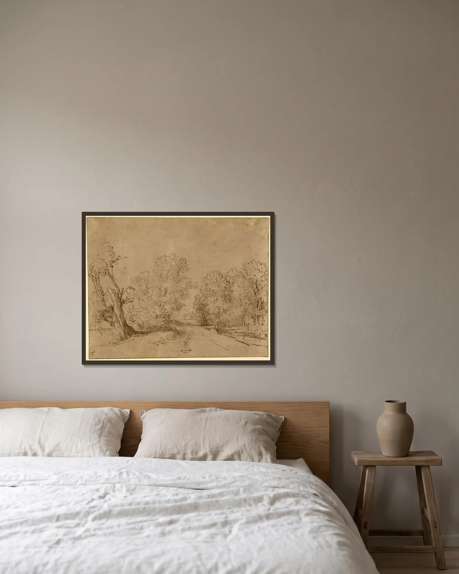 A Wooded Road av Rembrandt van Rijn inramad på en vägg