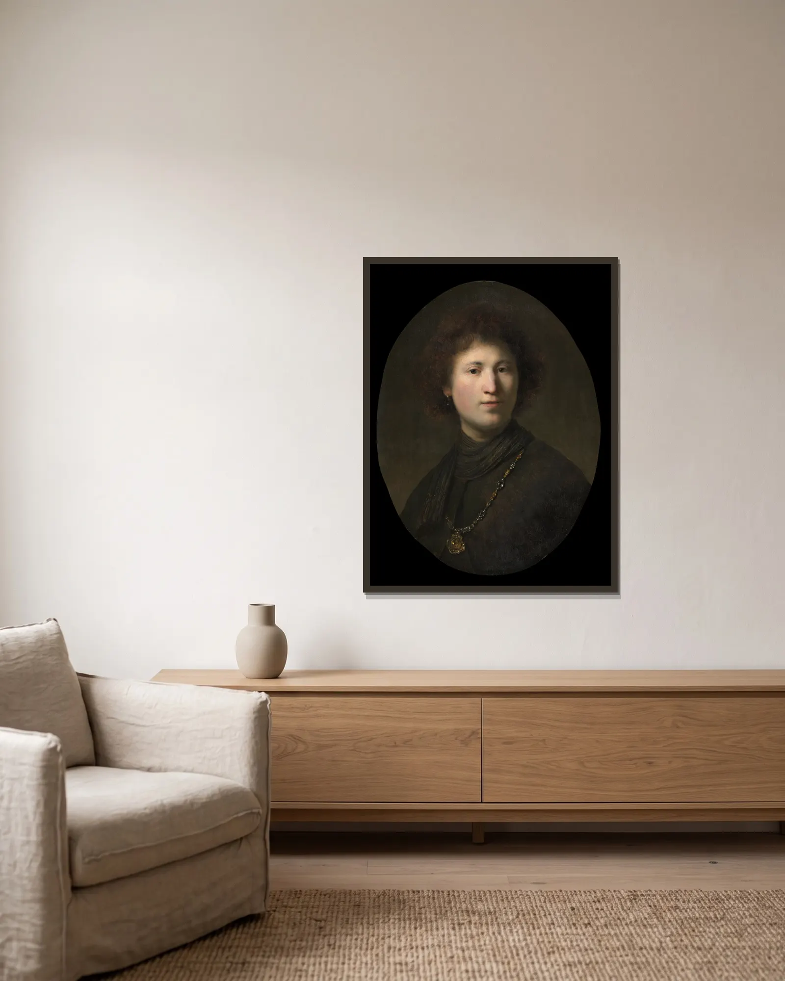 A Young Man with a Chain av Rembrandt van Rijn inramad på en vägg