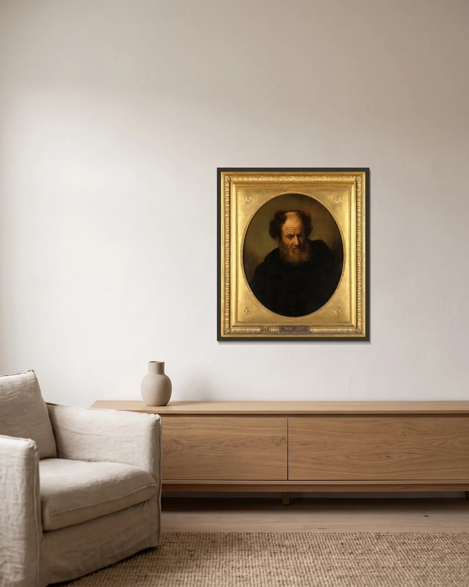 An Old Man av Rembrandt van Rijn inramad på en vägg