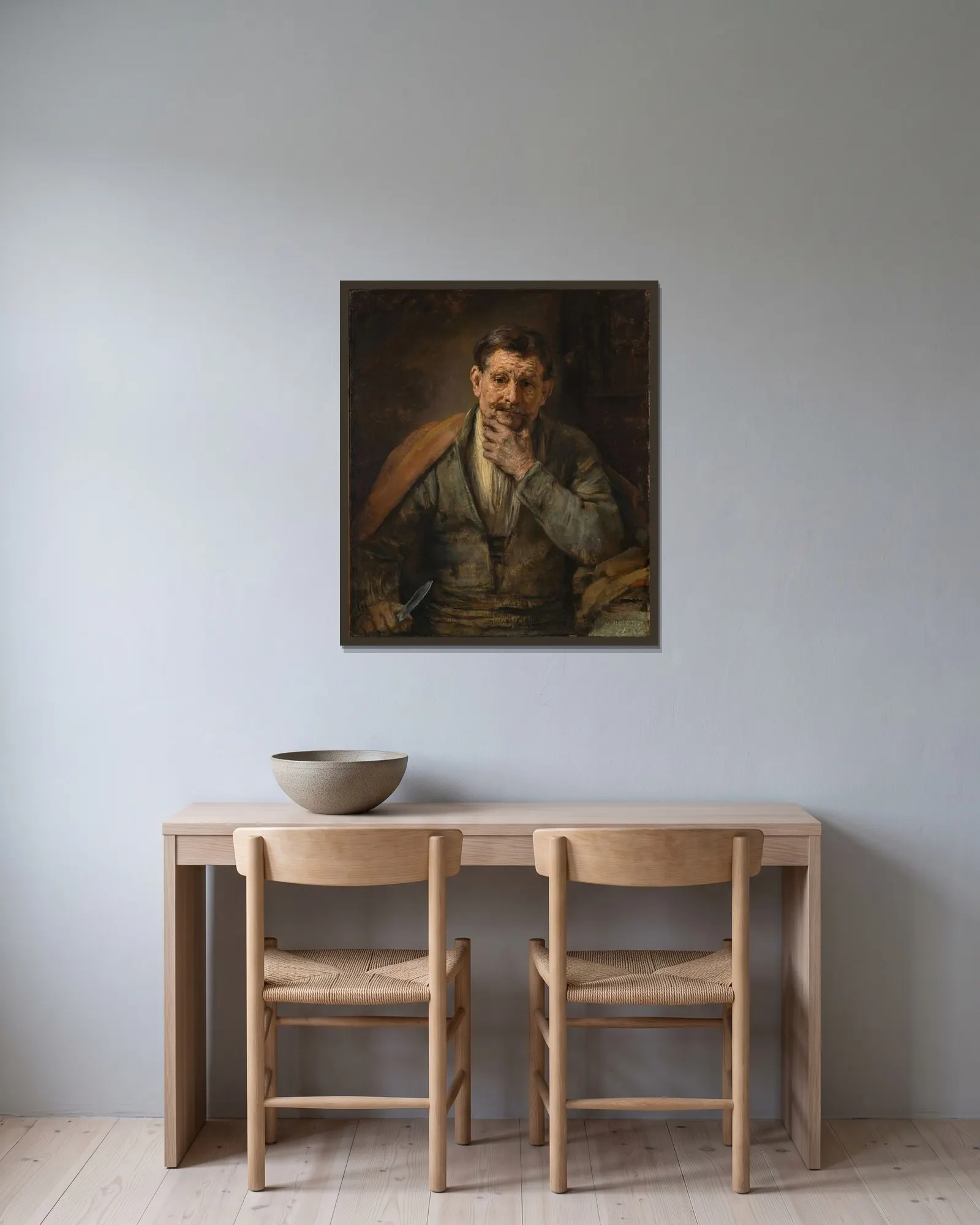 Saint Bartholomew av Rembrandt van Rijn inramad på en vägg