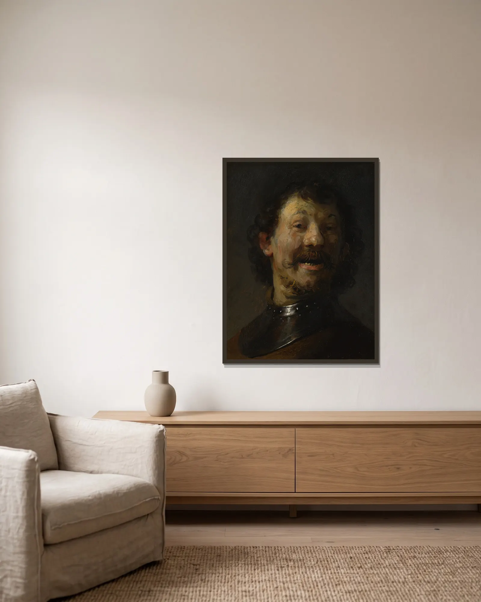 The Laughing Man av Rembrandt van Rijn inramad på en vägg