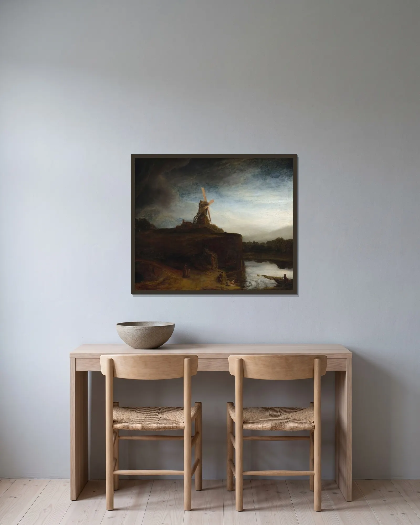 The Mill av Rembrandt van Rijn inramad på en vägg