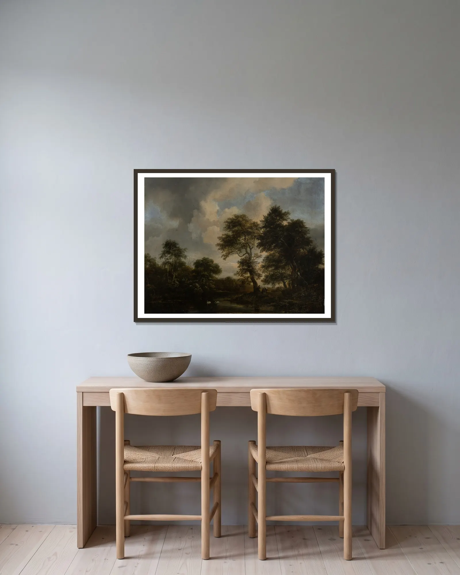 Forest Lake with two Swans av Jacob van Ruisdael inramad på en vägg