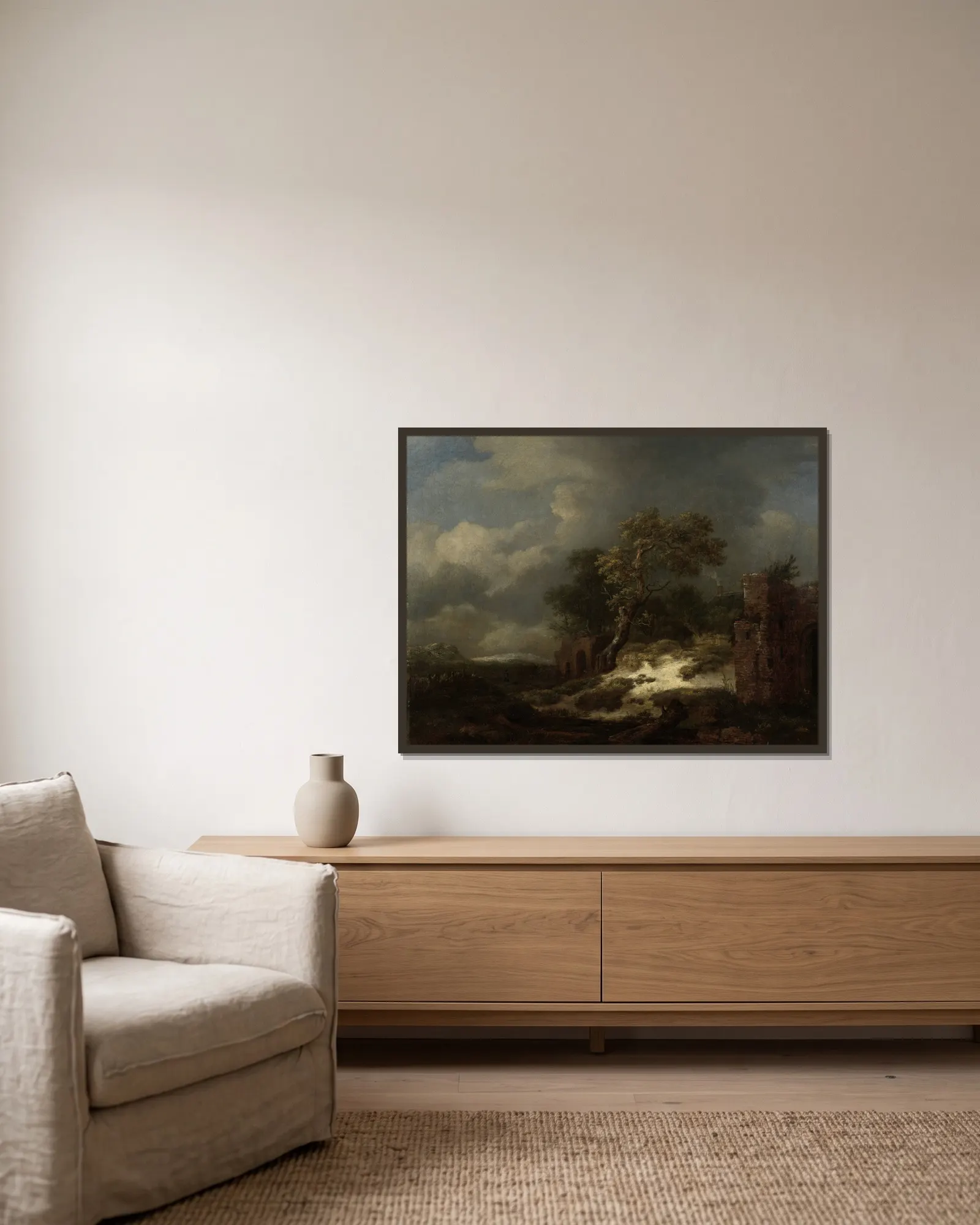 Landscape with Ruins av Jacob van Ruisdael inramad på en vägg
