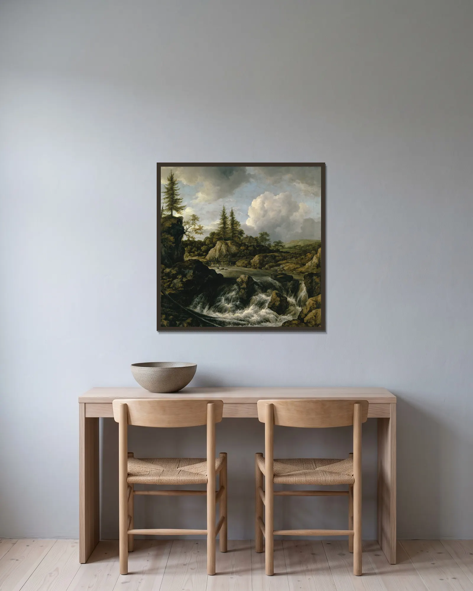 Landscape with Waterfall av Jacob van Ruisdael inramad på en vägg