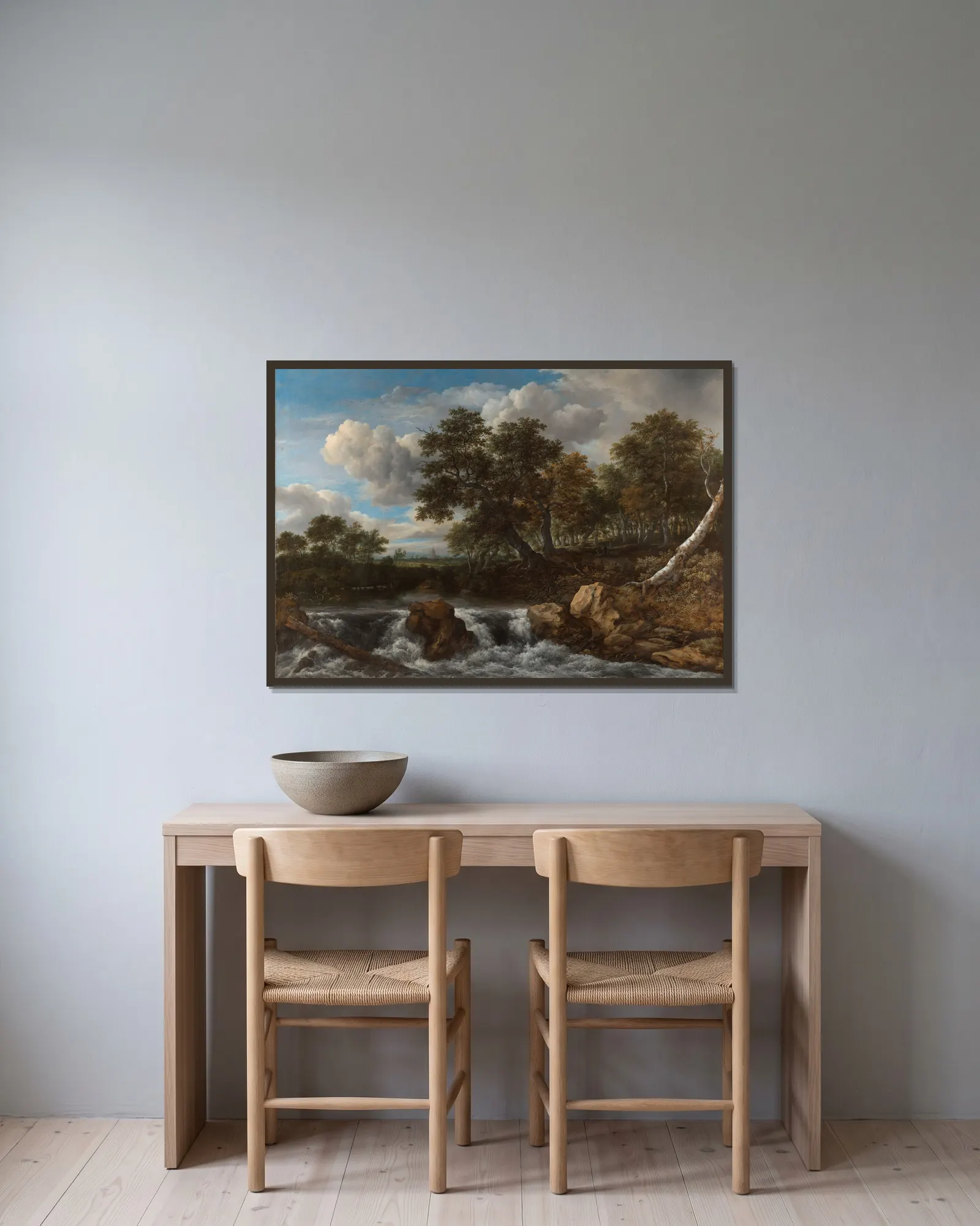 Landscape with Waterfall av Jacob van Ruisdael inramad på en vägg
