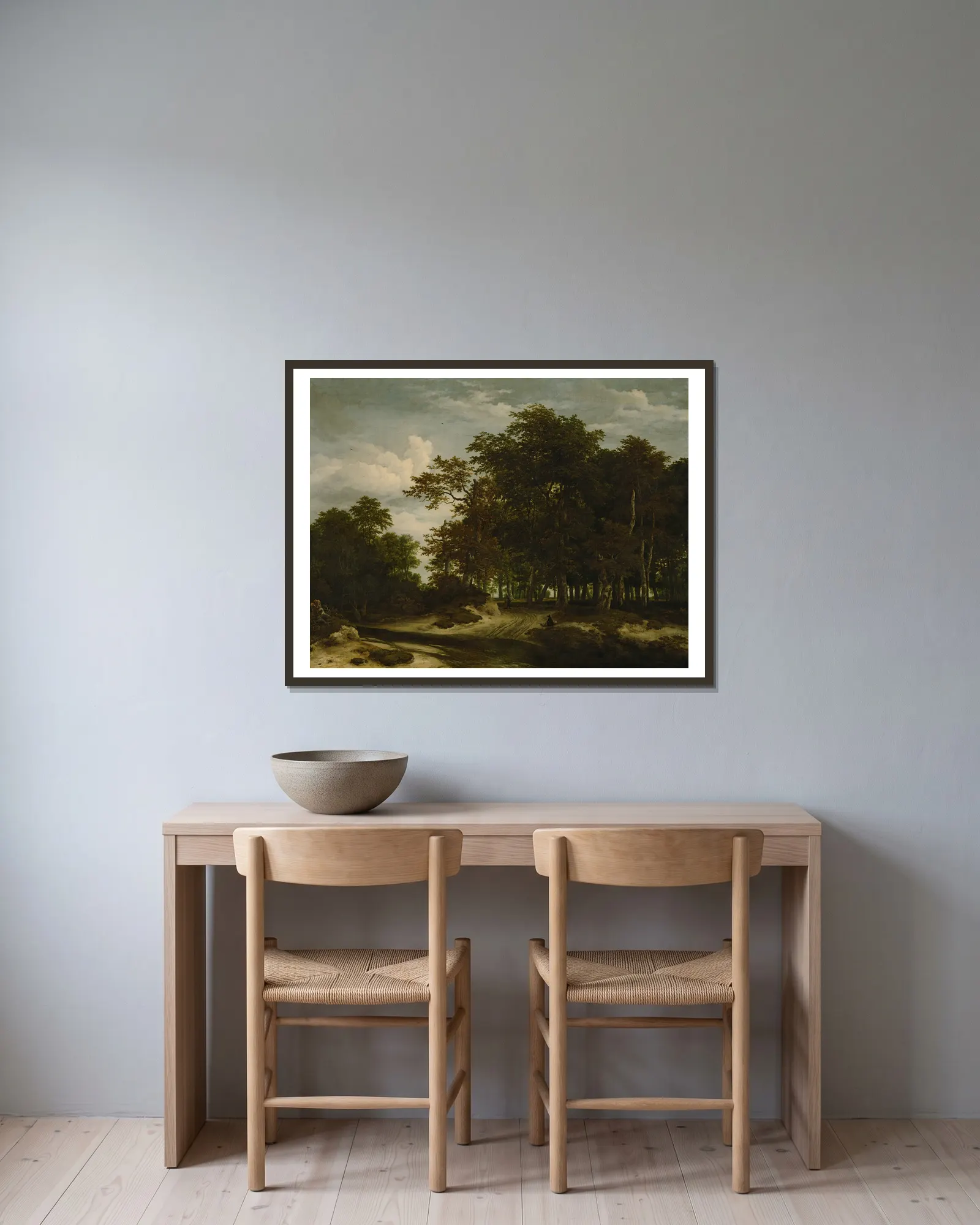 The Great Forest av Jacob van Ruisdael inramad på en vägg