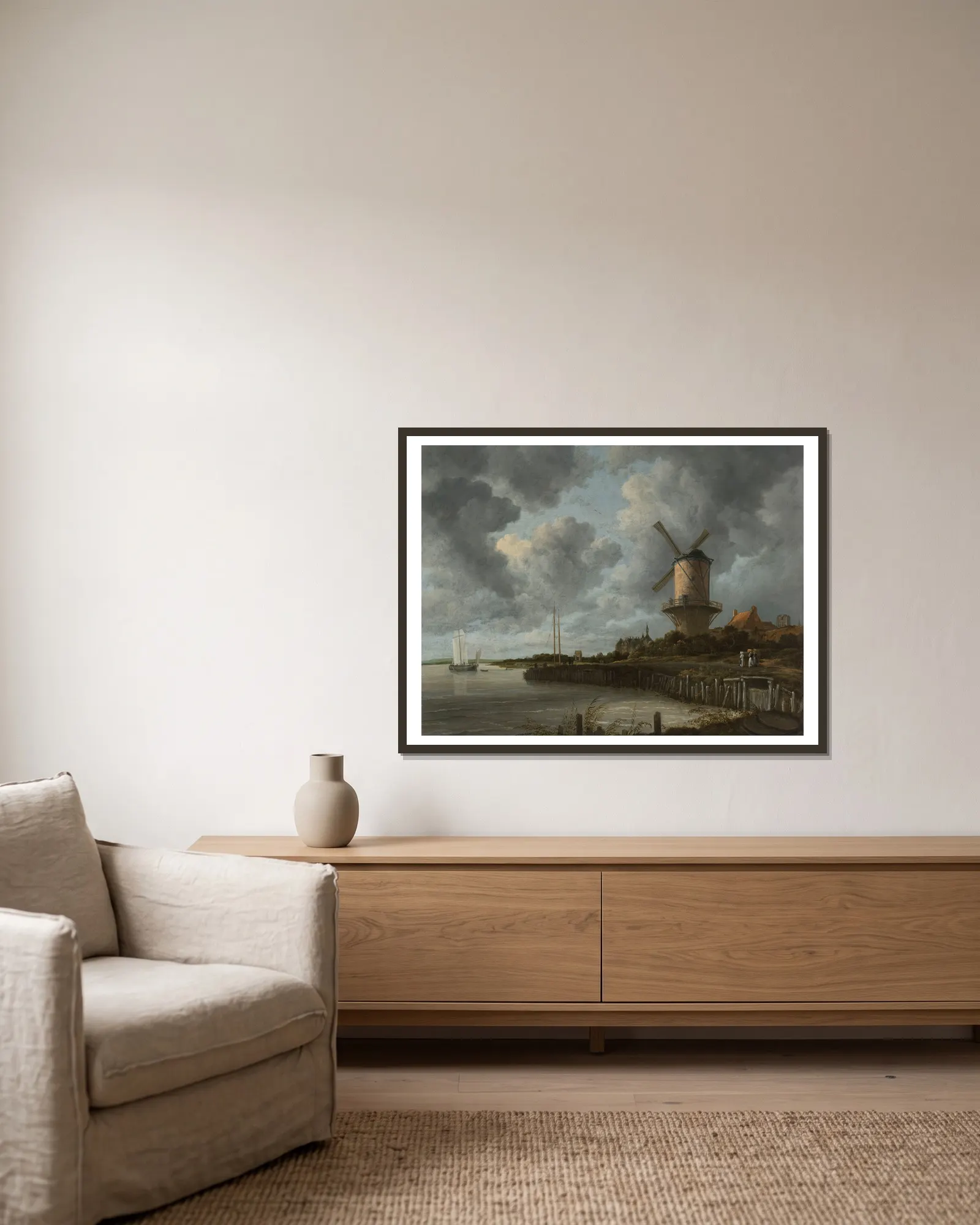 The Windmill at Wijk bij Duurstede av Jacob van Ruisdael inramad på en vägg