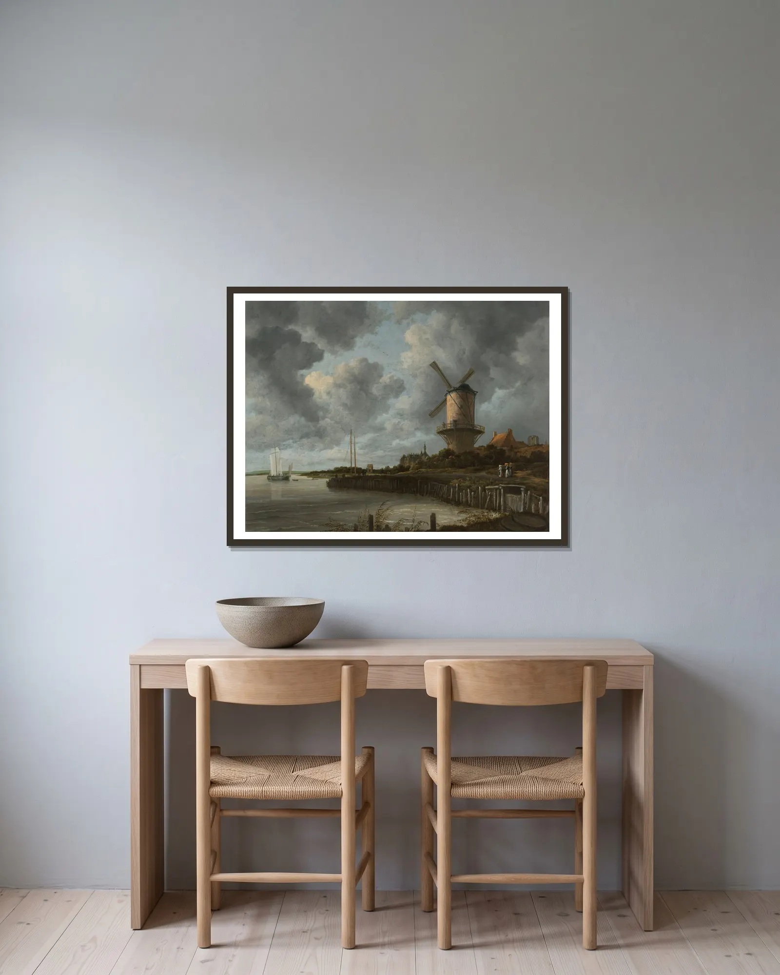 The Windmill at Wijk bij Duurstede av Jacob van Ruisdael inramad på en vägg