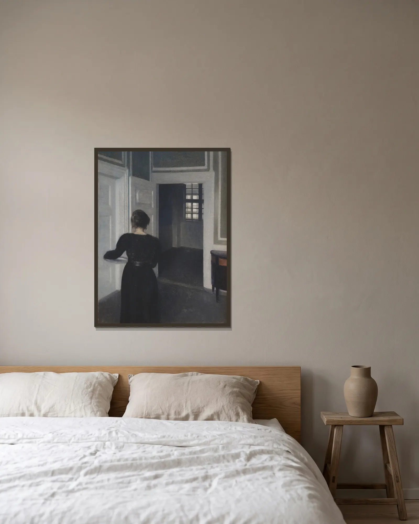 Ida In An Interior av Vilhelm Hammershøi inramad på en vägg