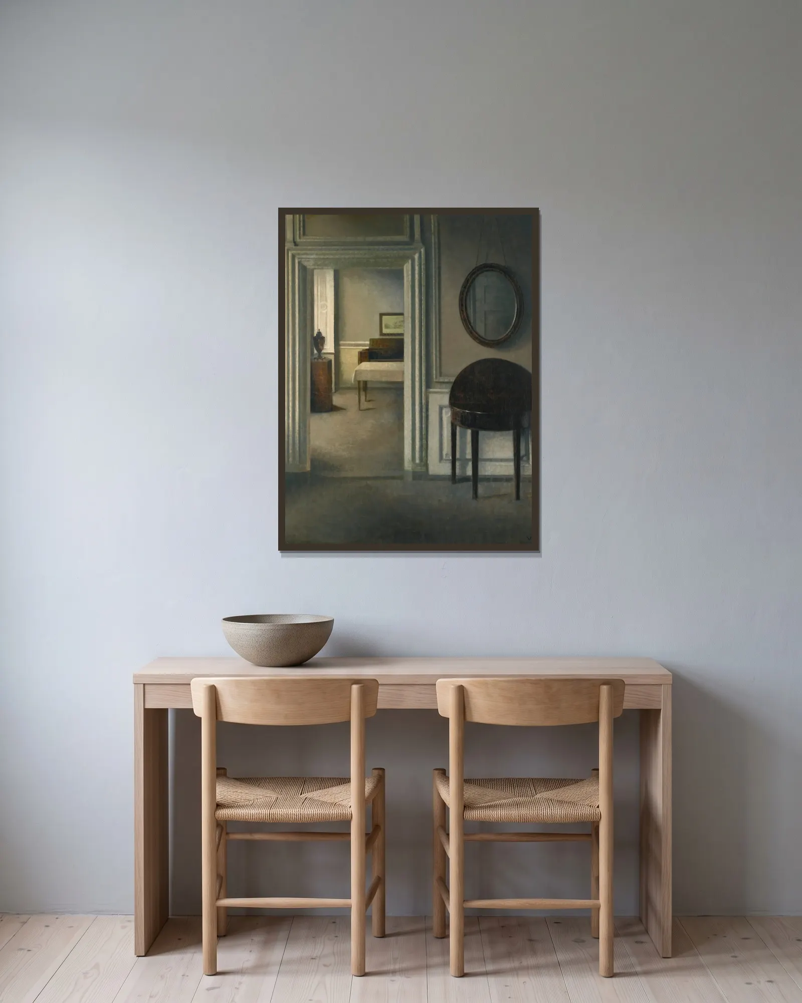 Interior With A Mirror av Vilhelm Hammershøi inramad på en vägg