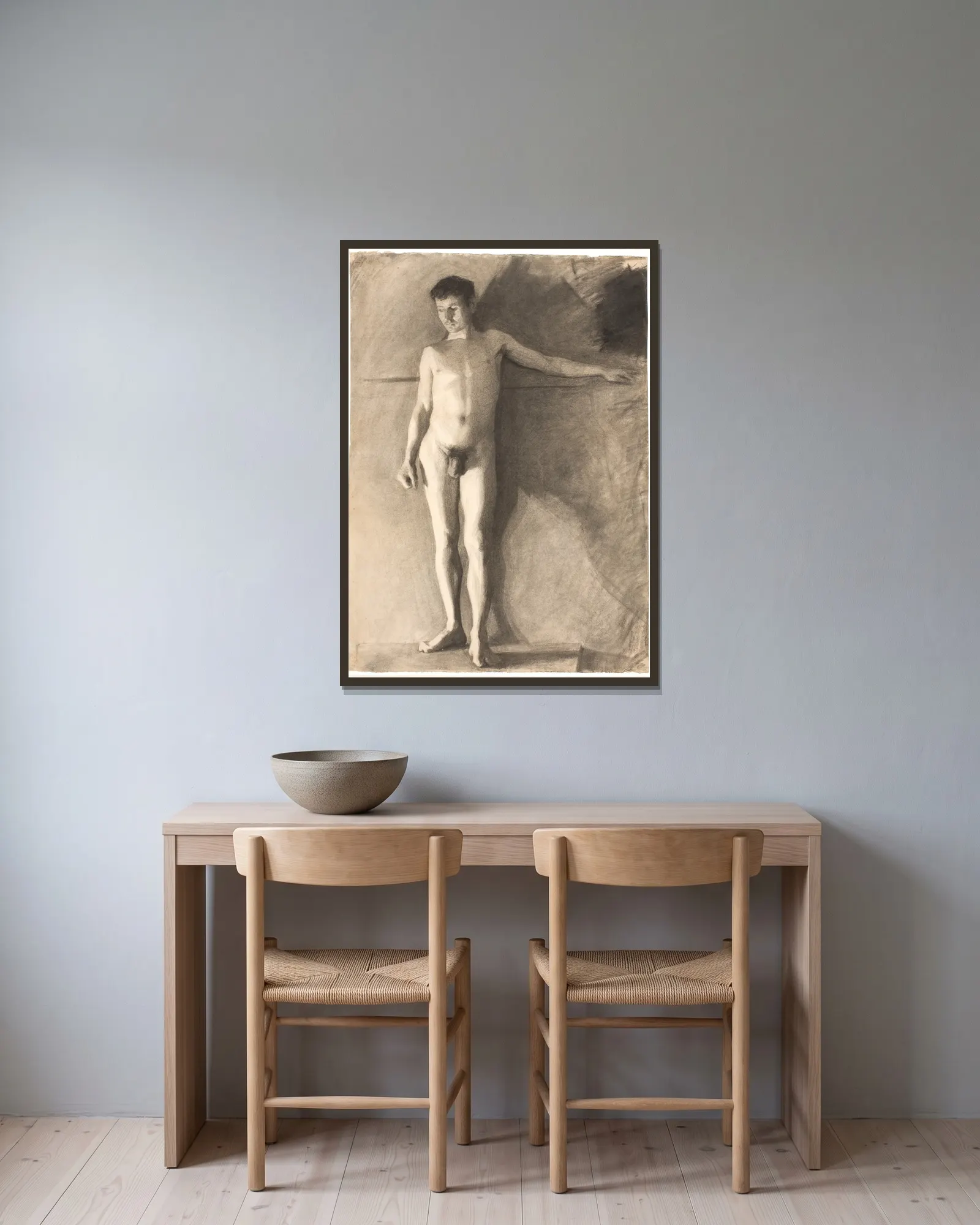Stående mandlig model av Vilhelm Hammershøi inramad på en vägg