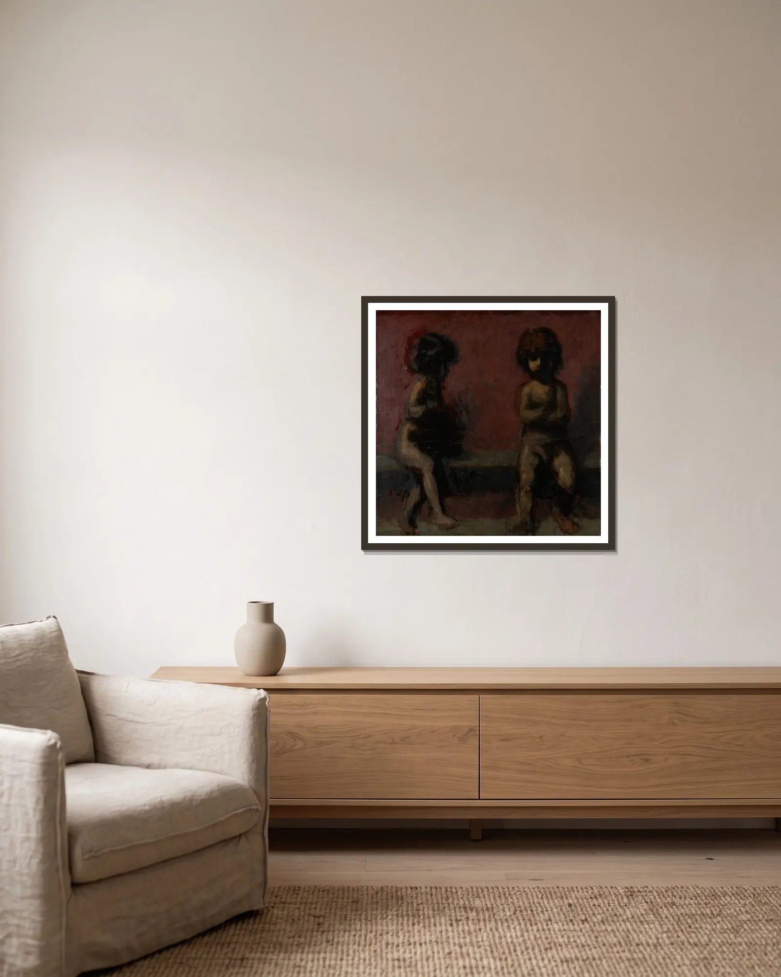 Two Putti av Hans Von Marées inramad på en vägg