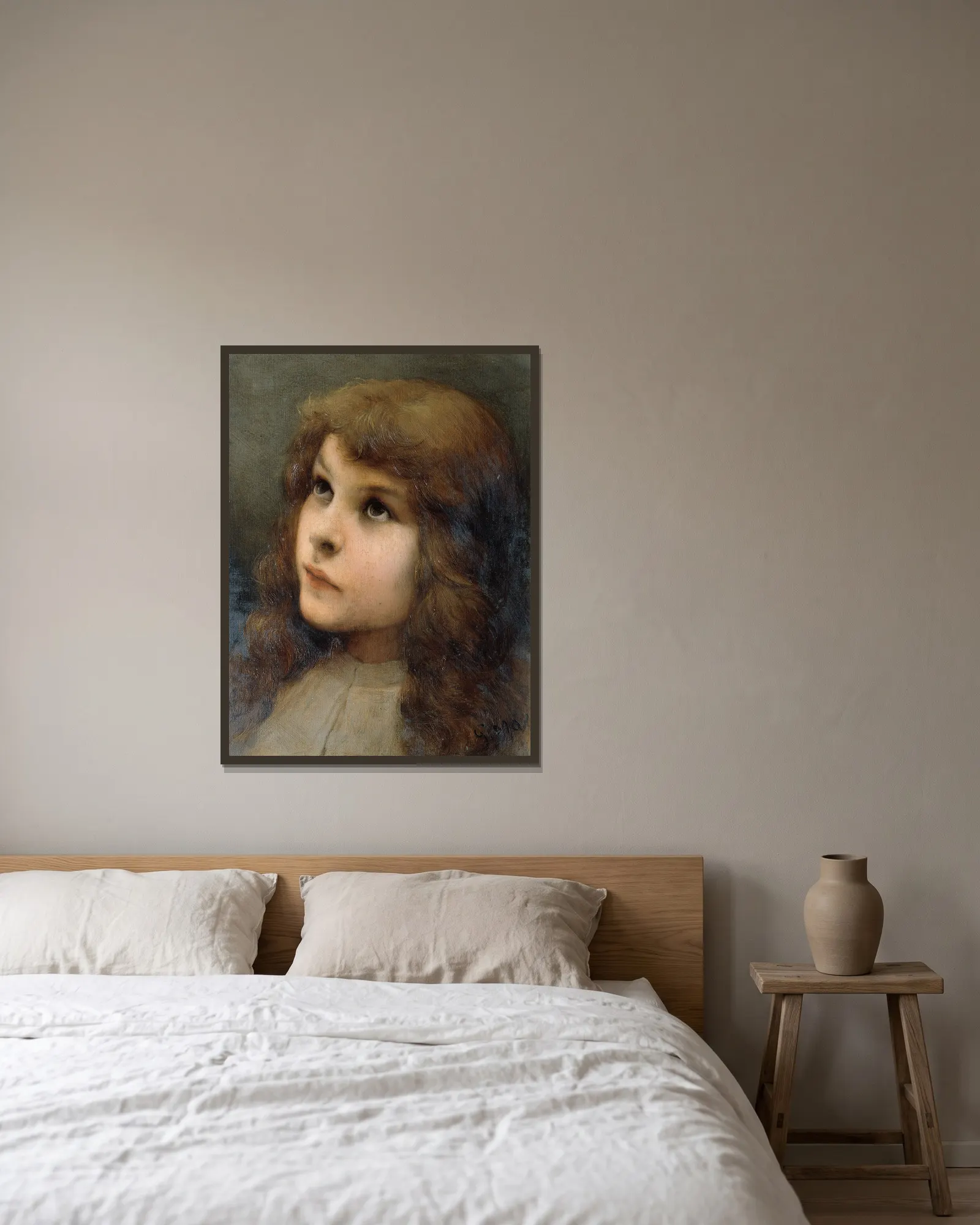 Studienkopf av Gabriel von Max inramad på en vägg