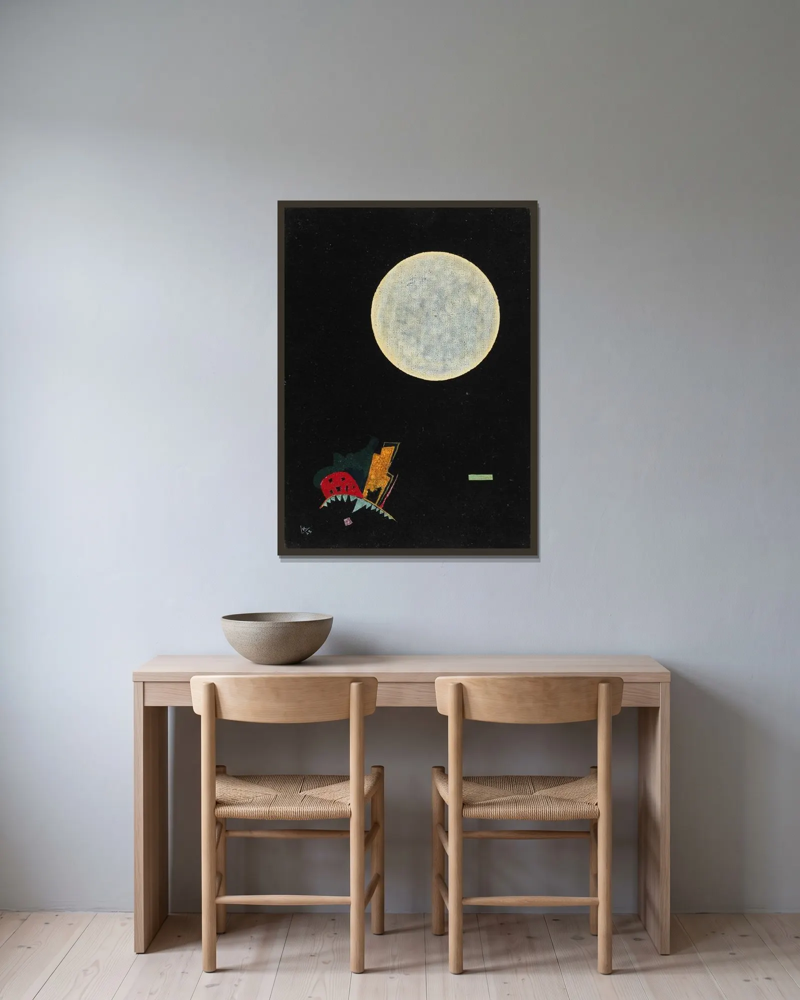 A Circle (A) av Wassily Kandinsky inramad på en vägg