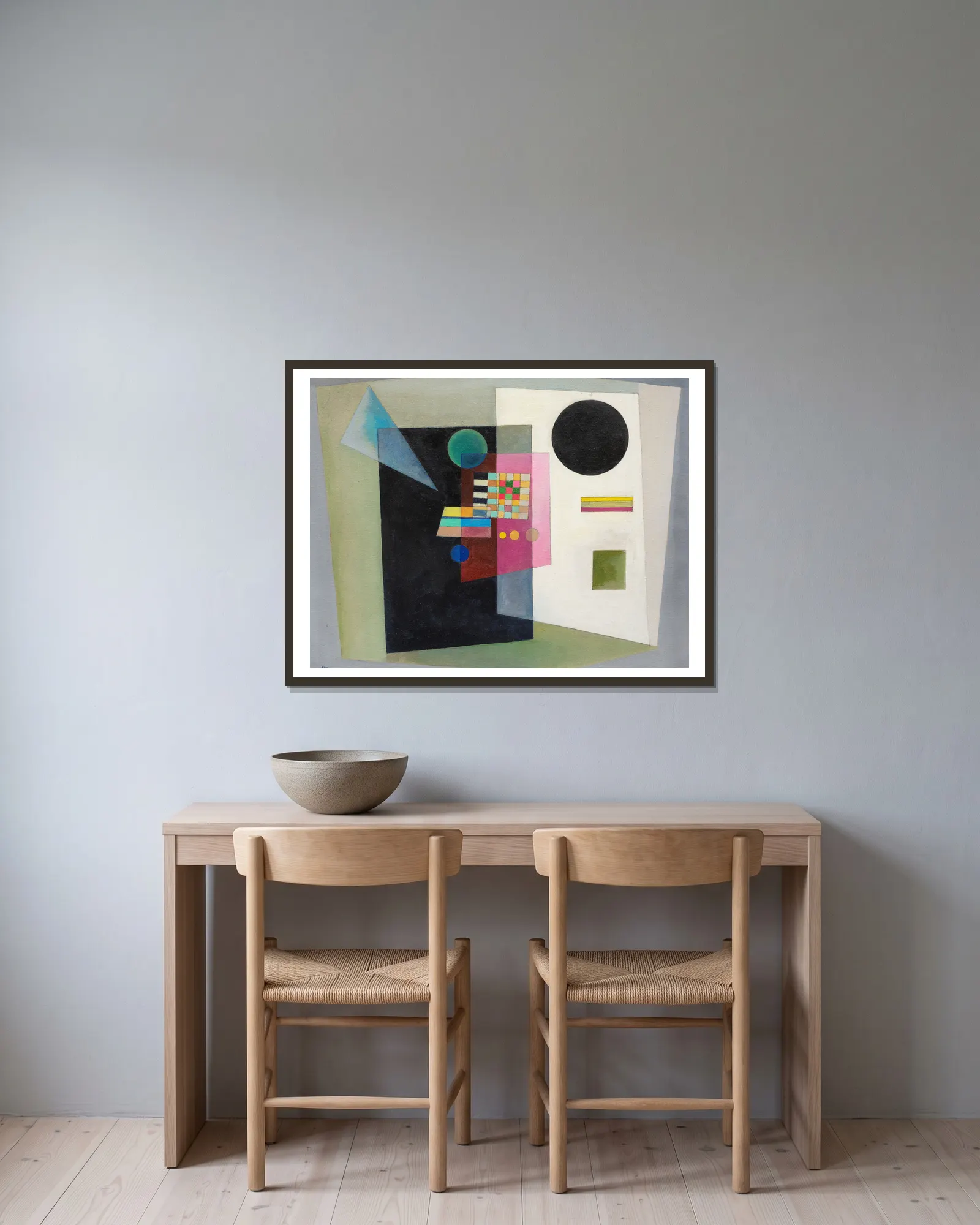 Behauptend av Wassily Kandinsky inramad på en vägg