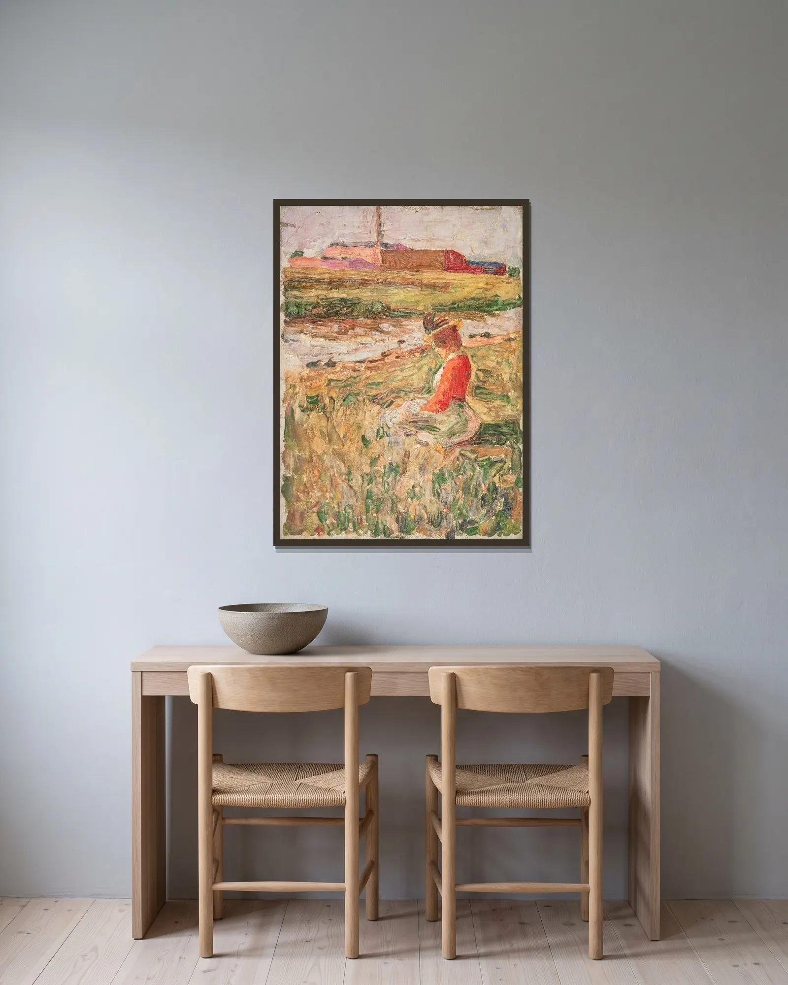 Dame im Gras sitzend av Wassily Kandinsky inramad på en vägg