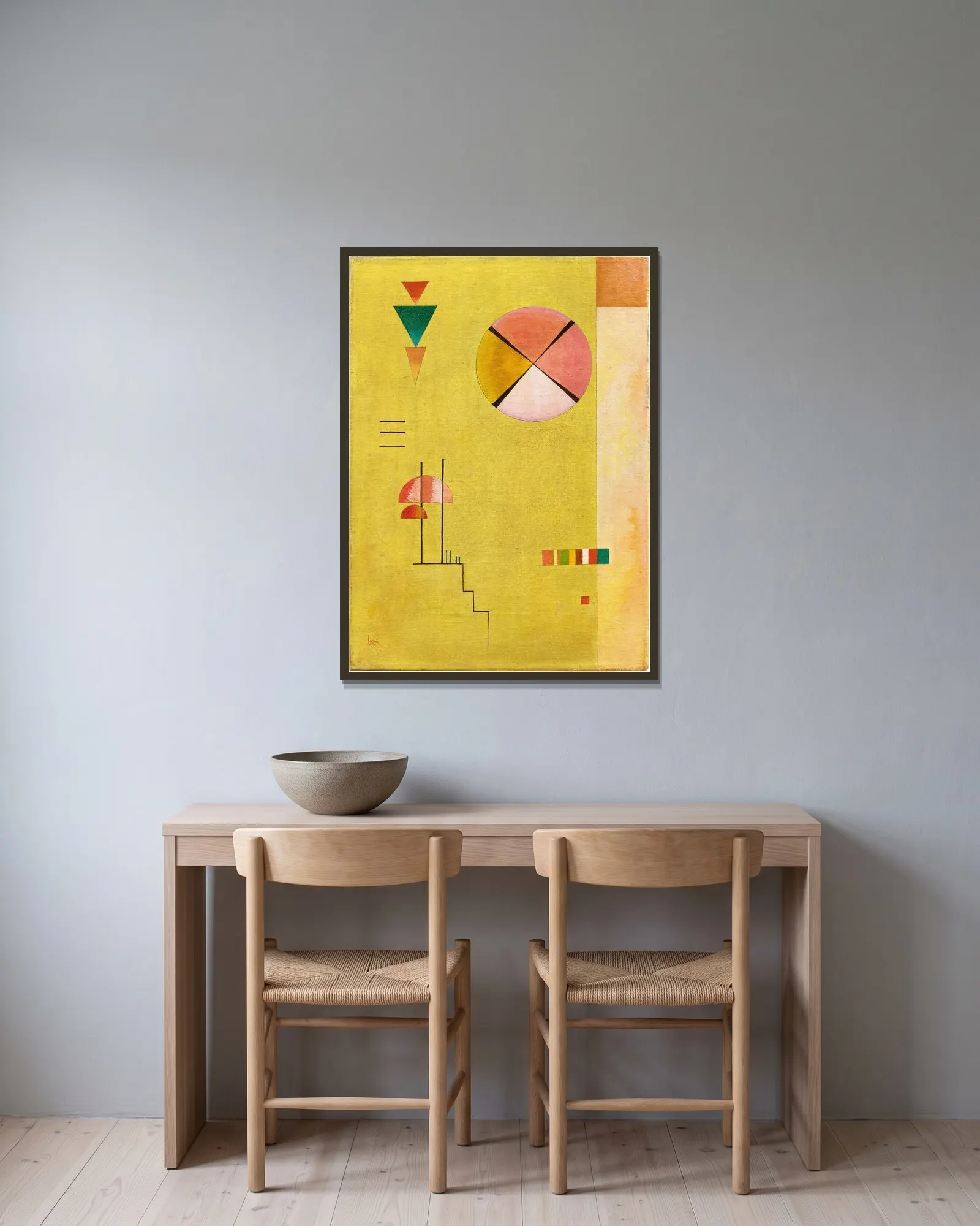 Lustiges Gelb (Cheerful Yellow) av Wassily Kandinsky inramad på en vägg