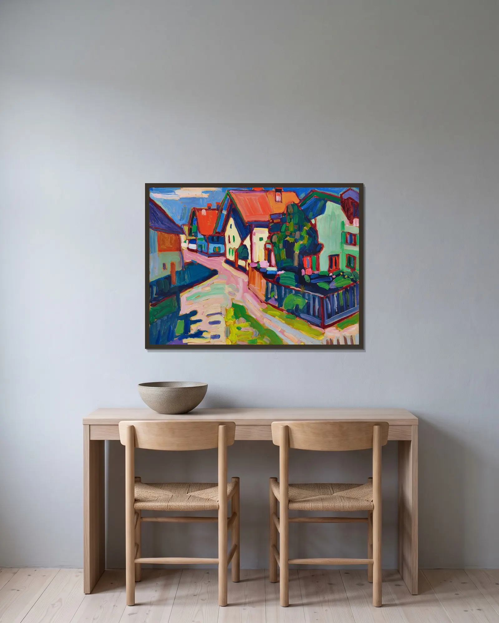 Murnau av Wassily Kandinsky inramad på en vägg
