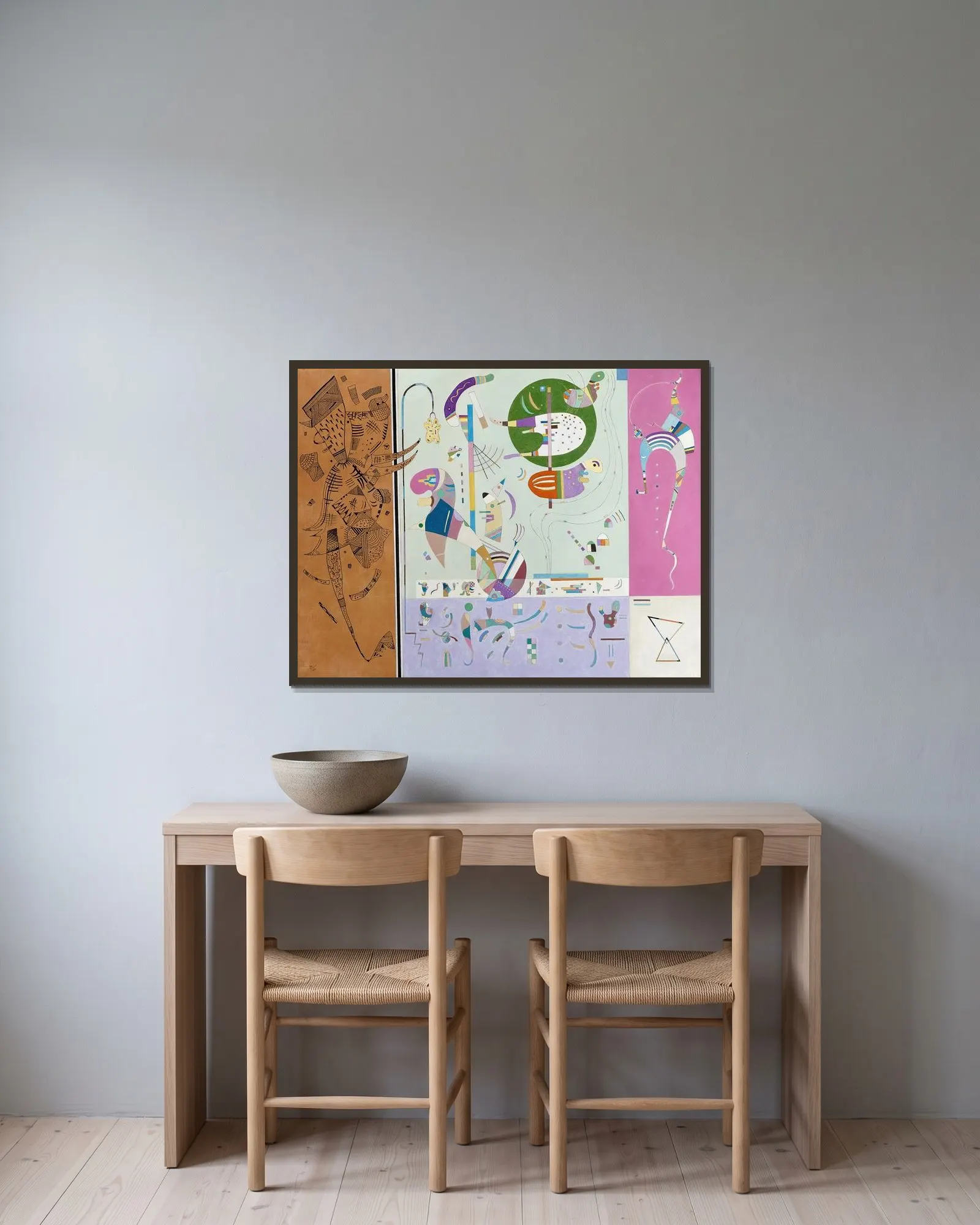 Parties diverse av Wassily Kandinsky inramad på en vägg