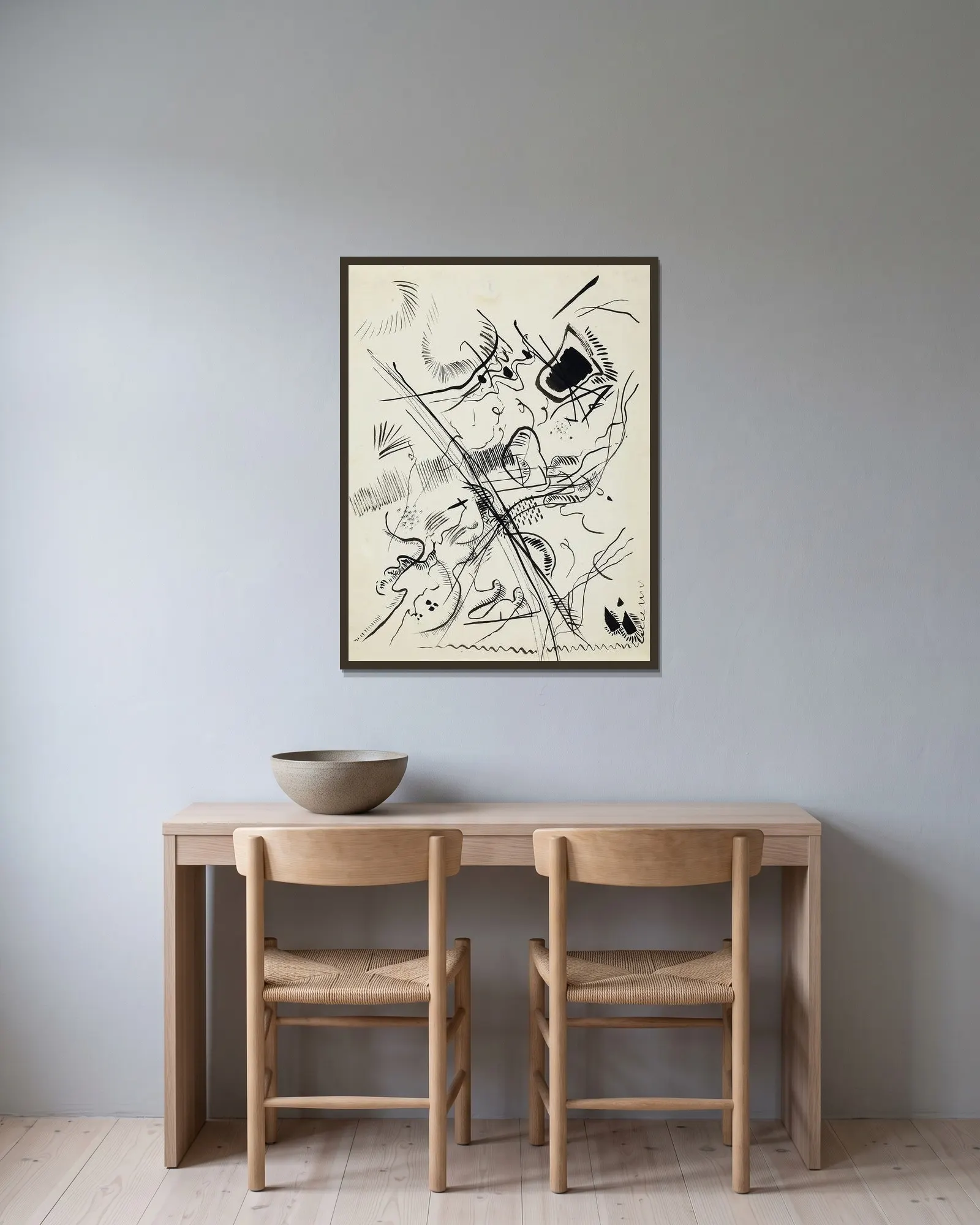 Untitled av Wassily Kandinsky inramad på en vägg
