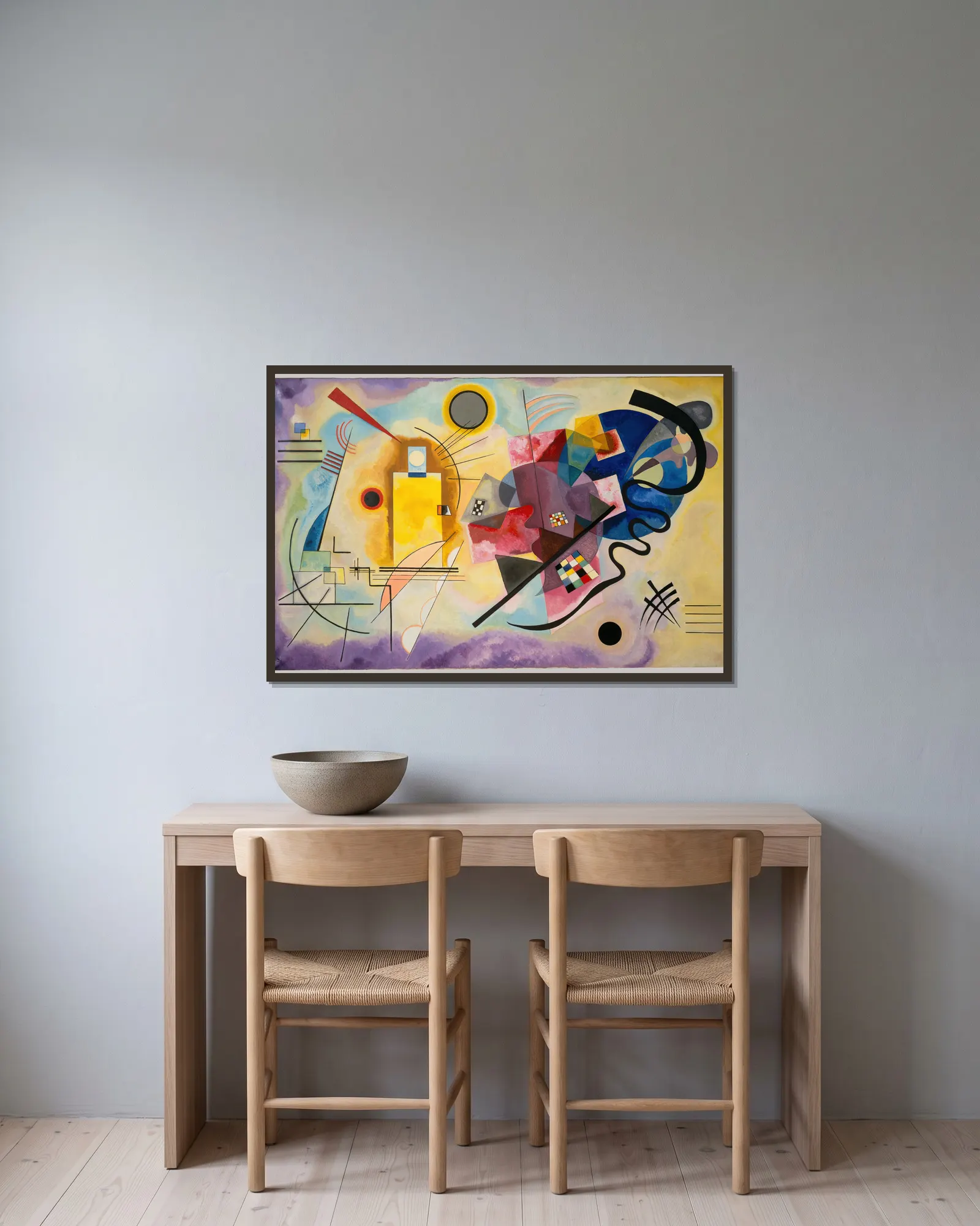 Yellow-Red-Blue av Wassily Kandinsky inramad på en vägg