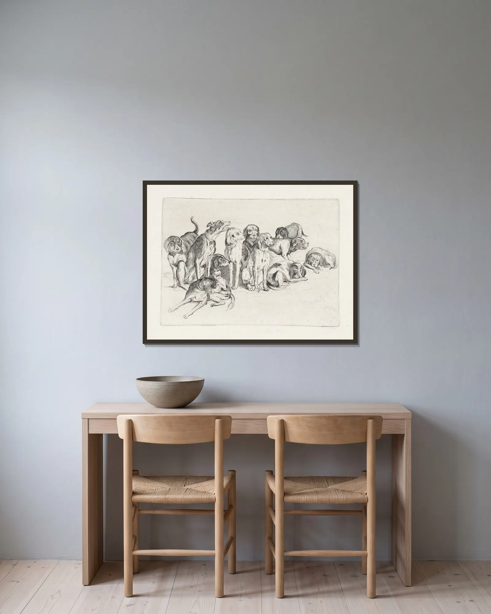 Eleven Hounds av Wenceslaus Hollar inramad på en vägg
