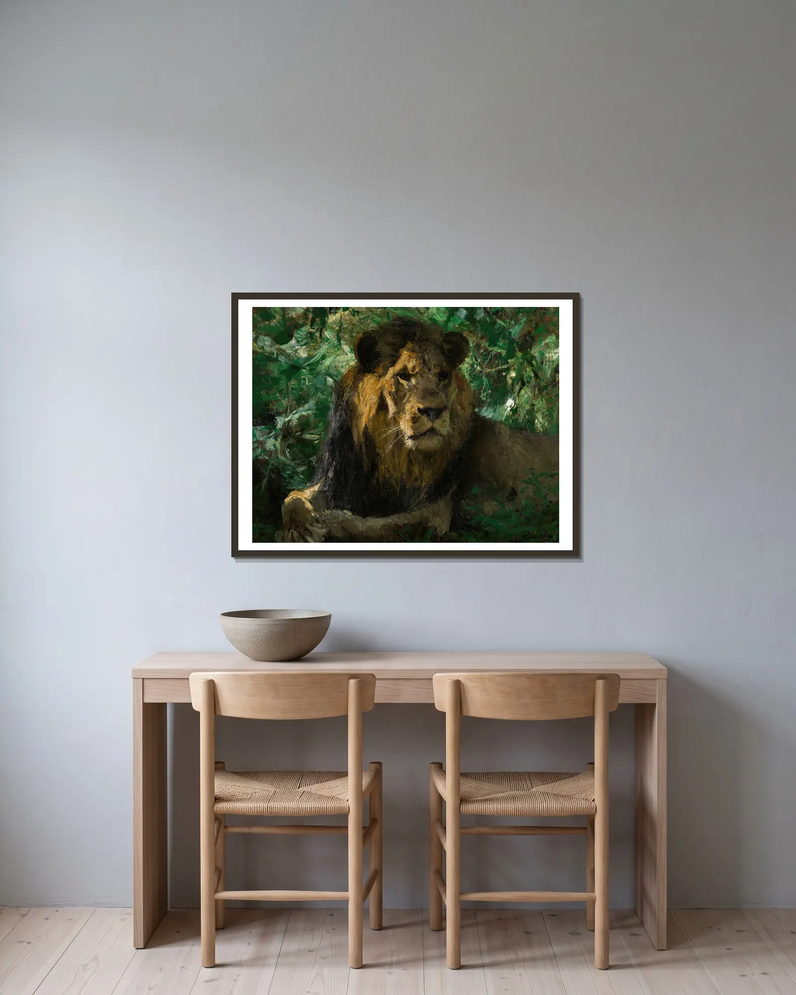 Resting Lion av Wilhelm Kuhnert inramad på en vägg
