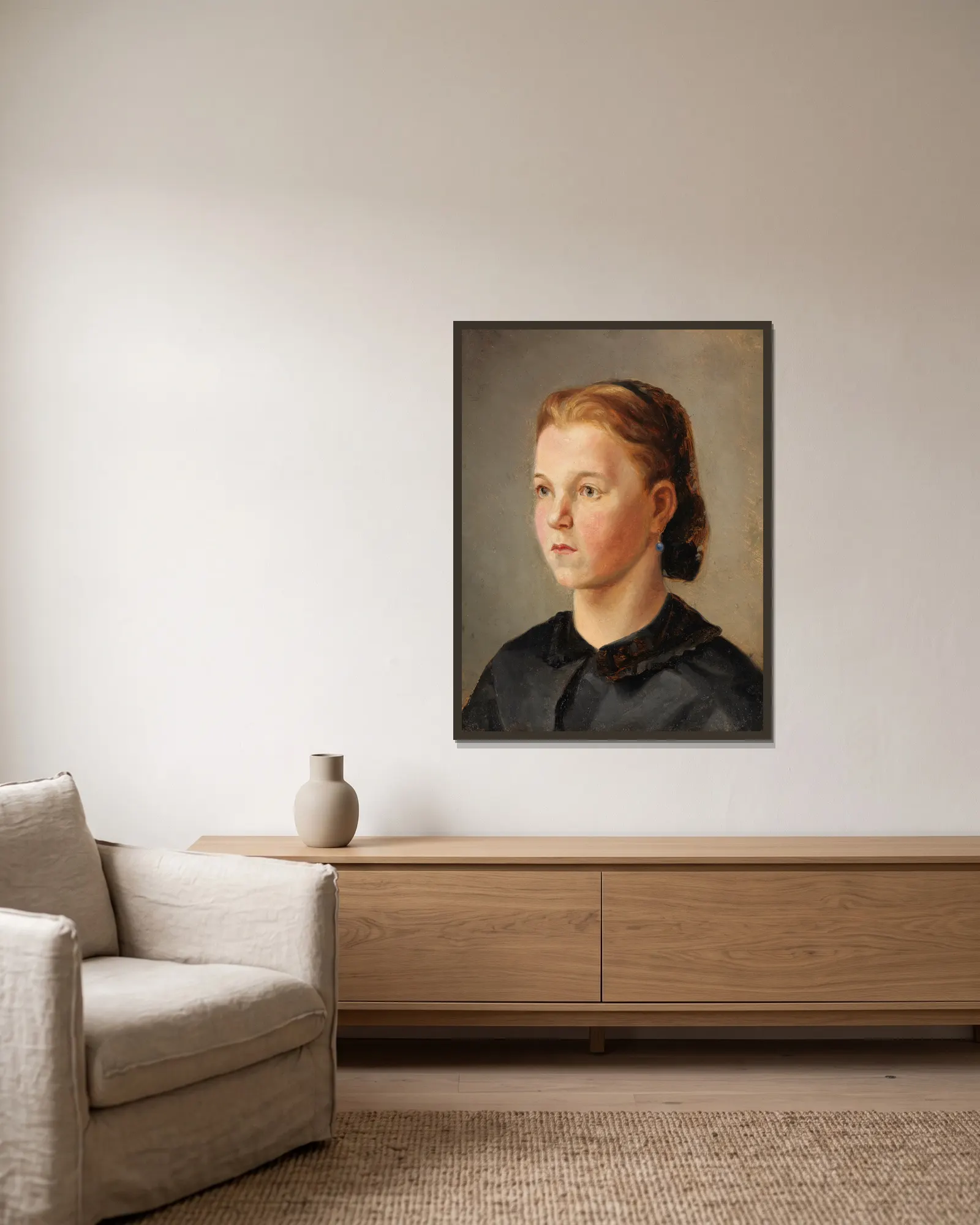 Mädchenbildnis (Therese Heyden) av Wilhelm Leibl inramad på en vägg