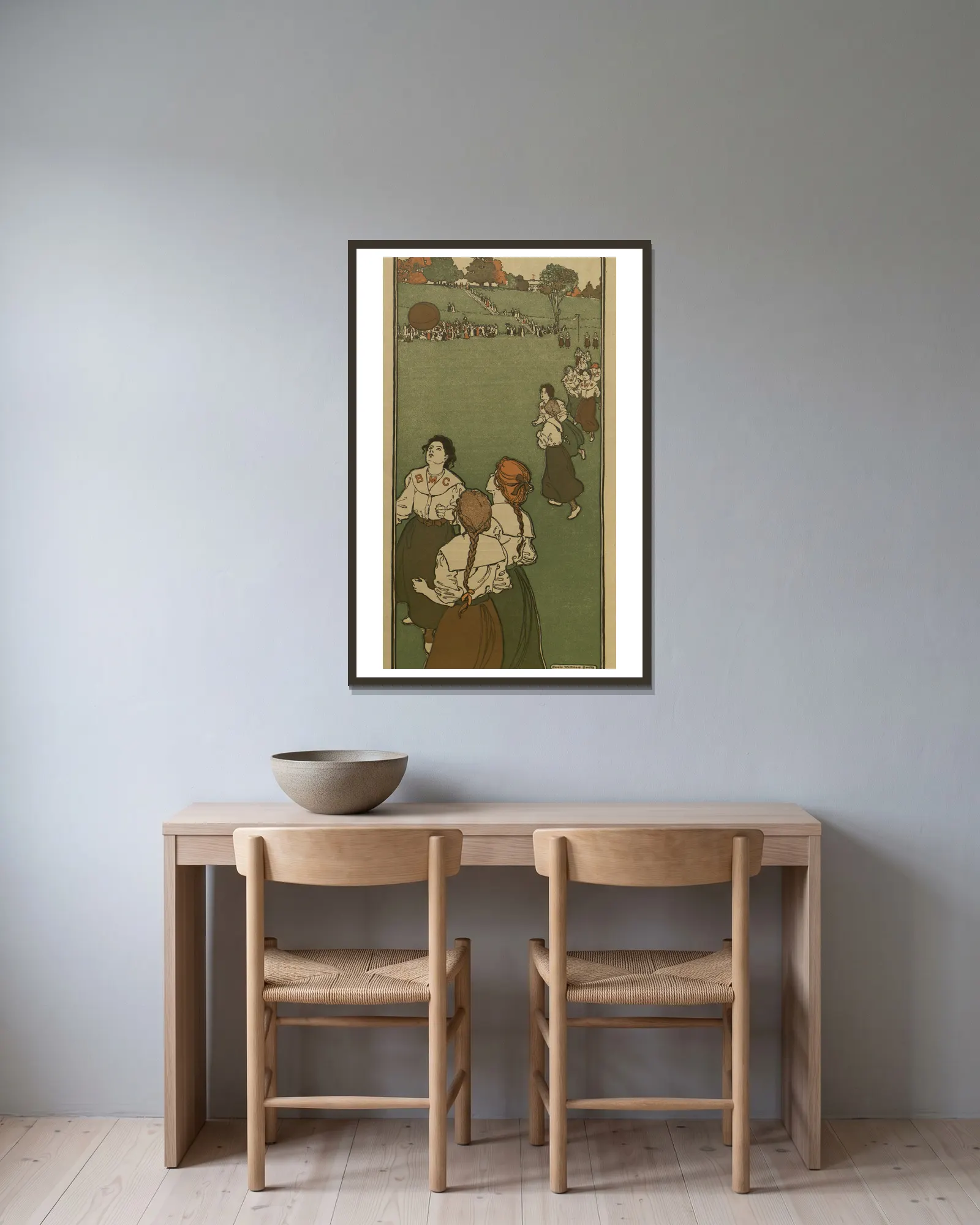 Febuary av Jessie Willcox Smith inramad på en vägg