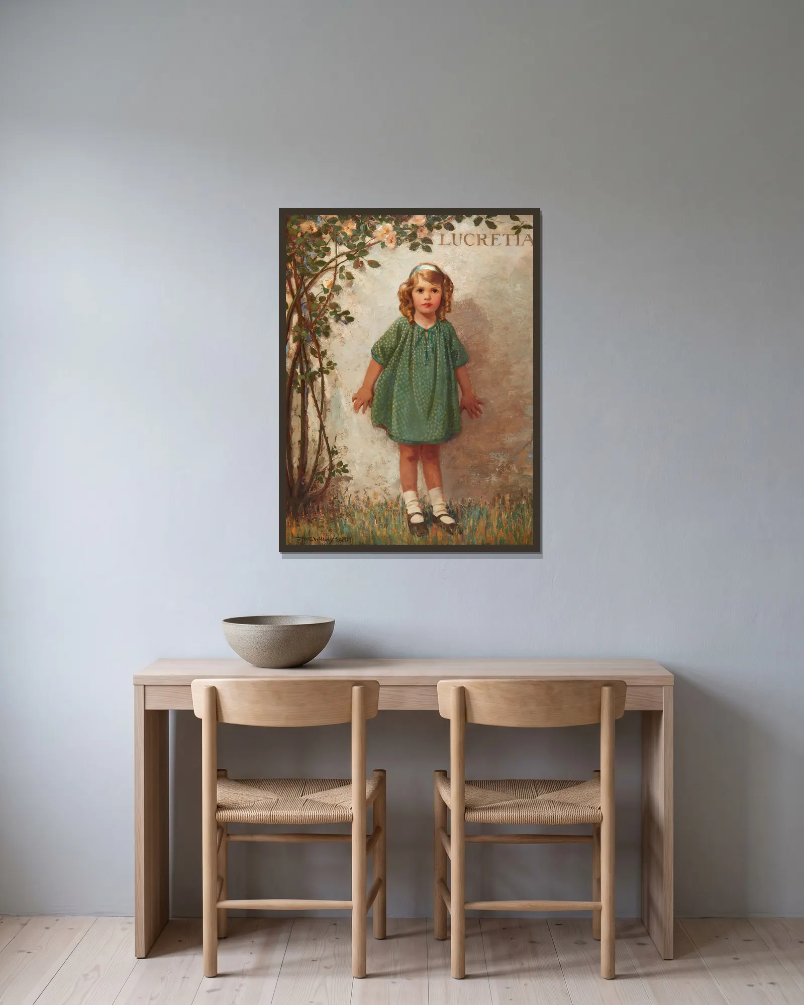 Lucretia av Jessie Willcox Smith inramad på en vägg