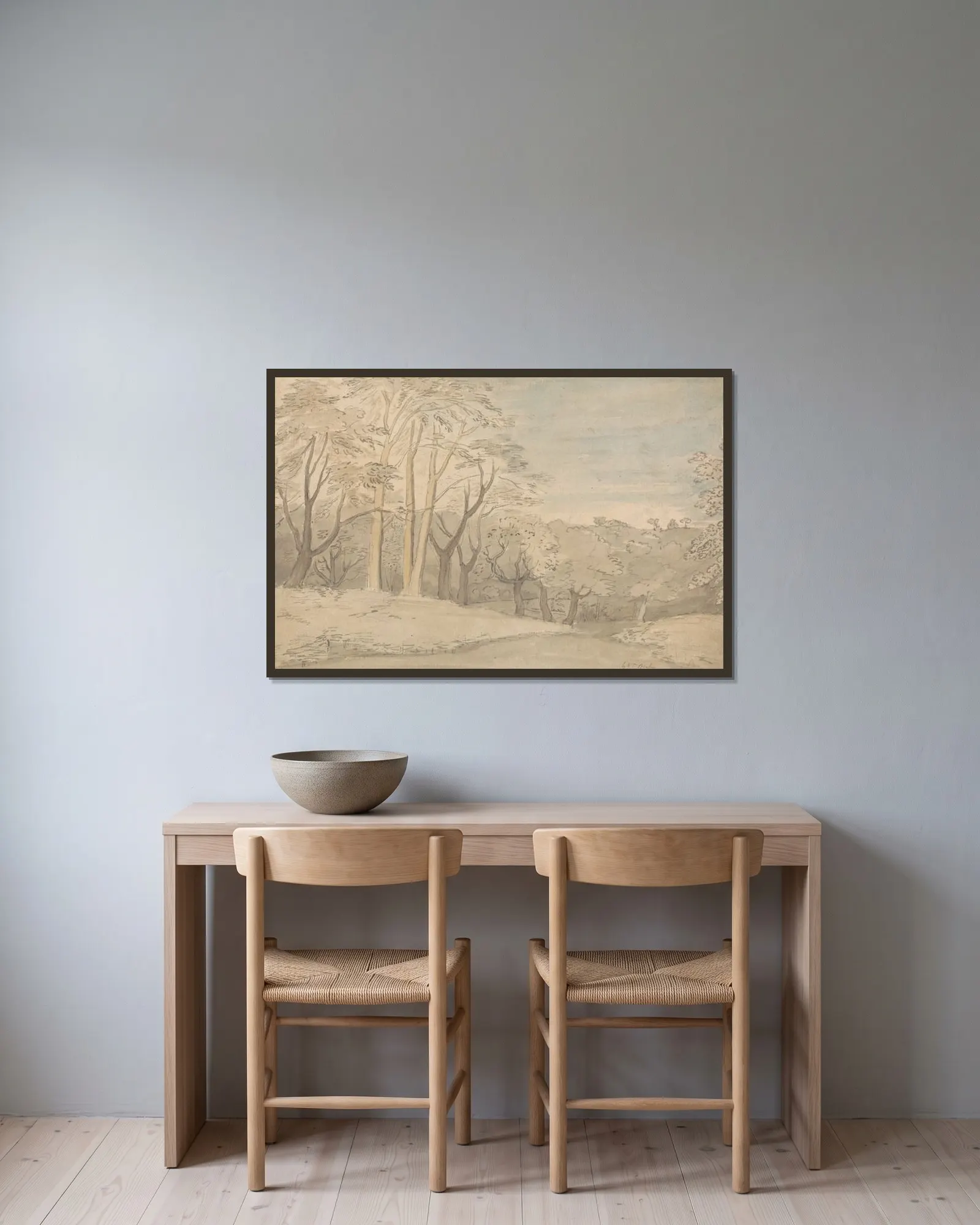A Woody Landscape av William Blake inramad på en vägg