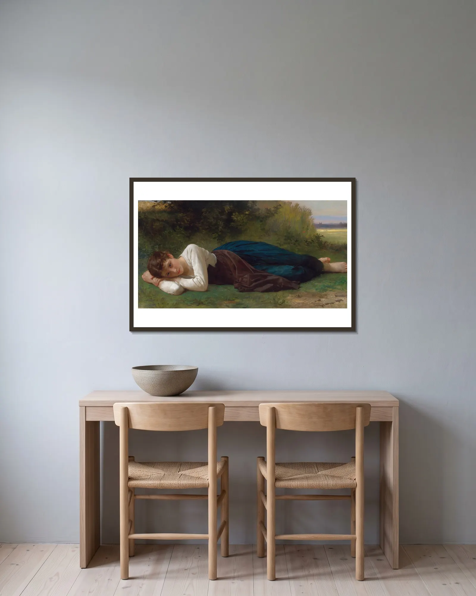 Le Repos (Jeune Fille Couchée) av William Bouguereau inramad på en vägg