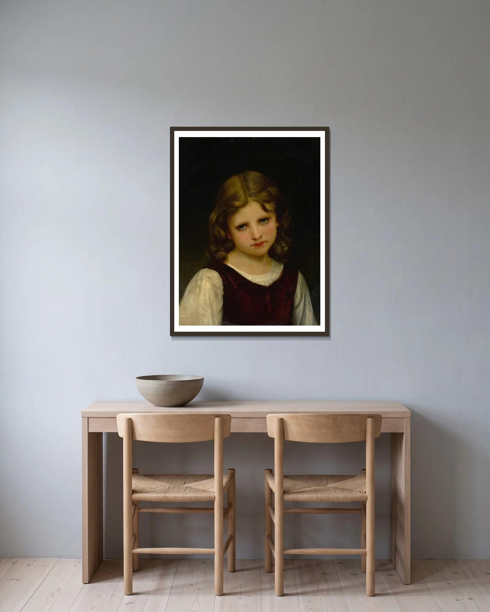 Mignon av William Bouguereau inramad på en vägg