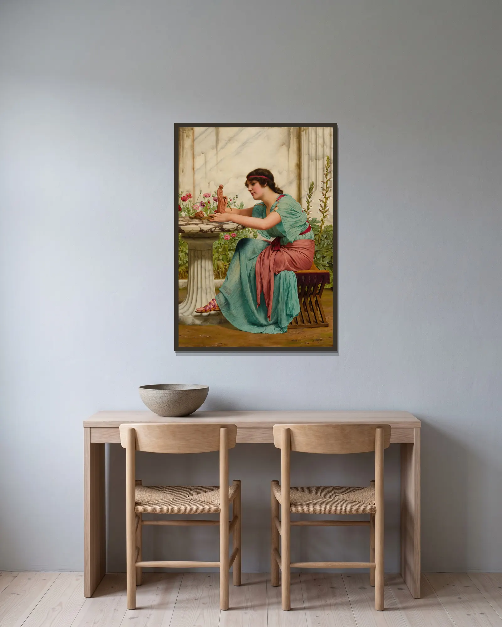 A Dilettante av John William Godward inramad på en vägg