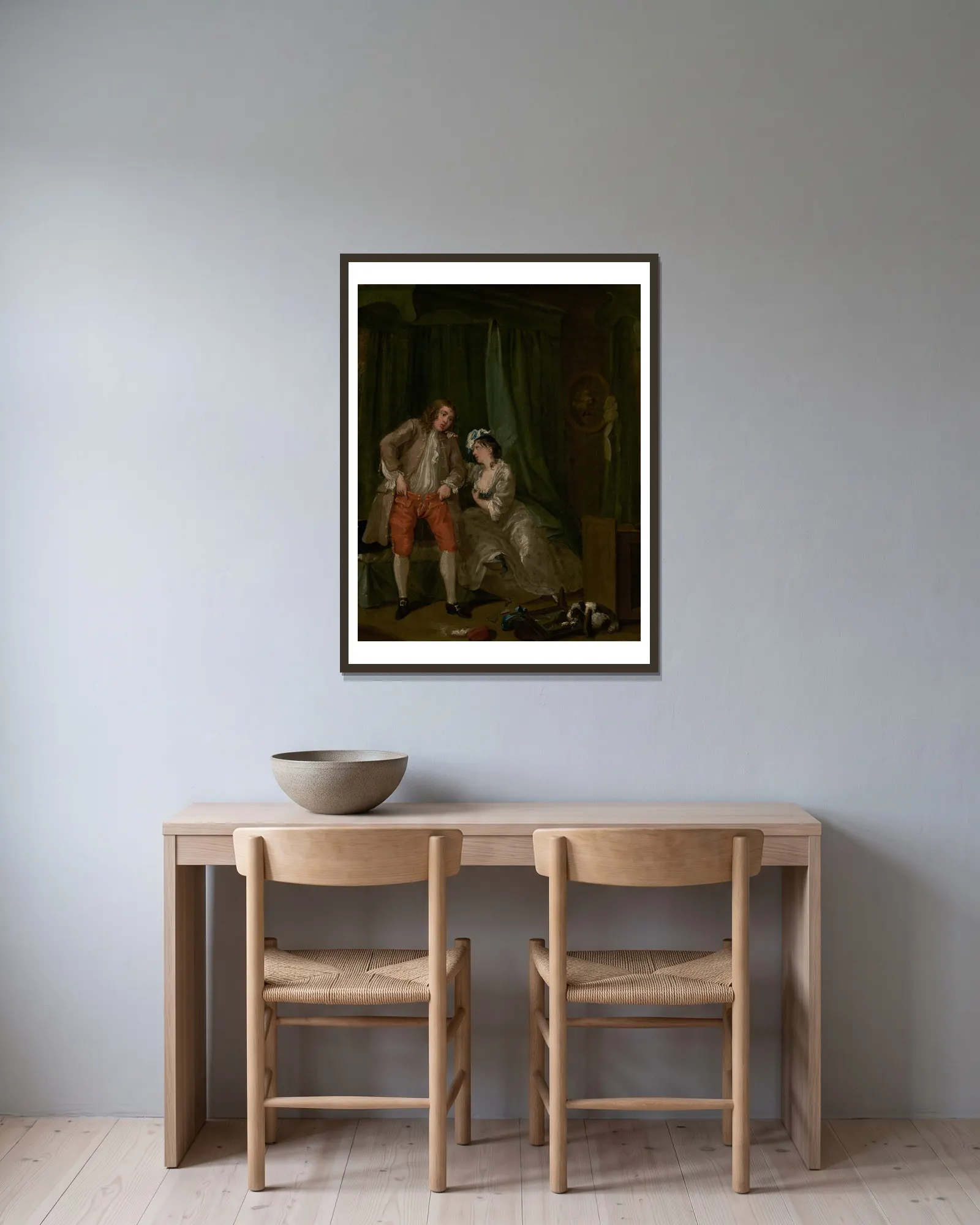 After av William Hogarth inramad på en vägg