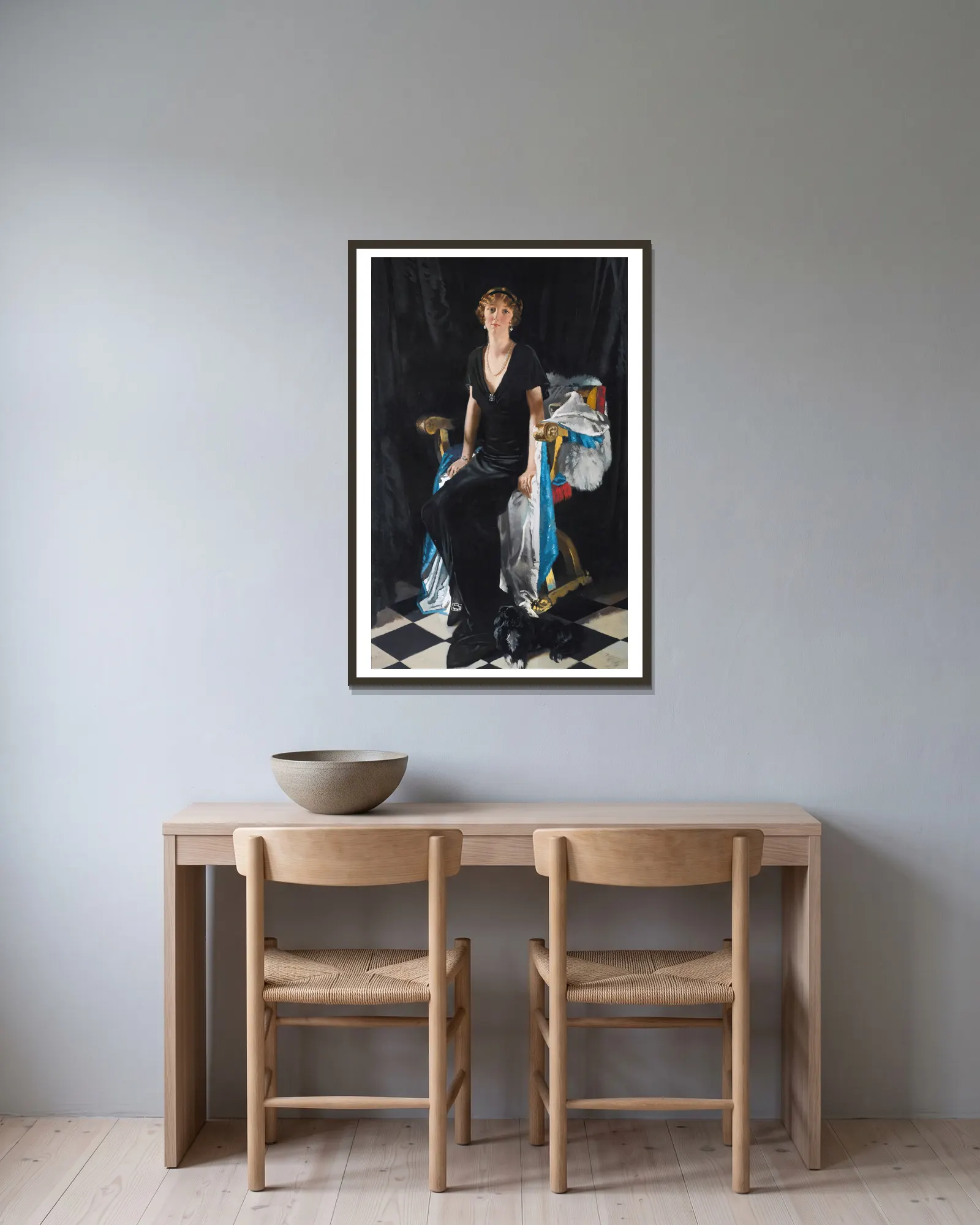 Idina Wallace av William Orpen inramad på en vägg