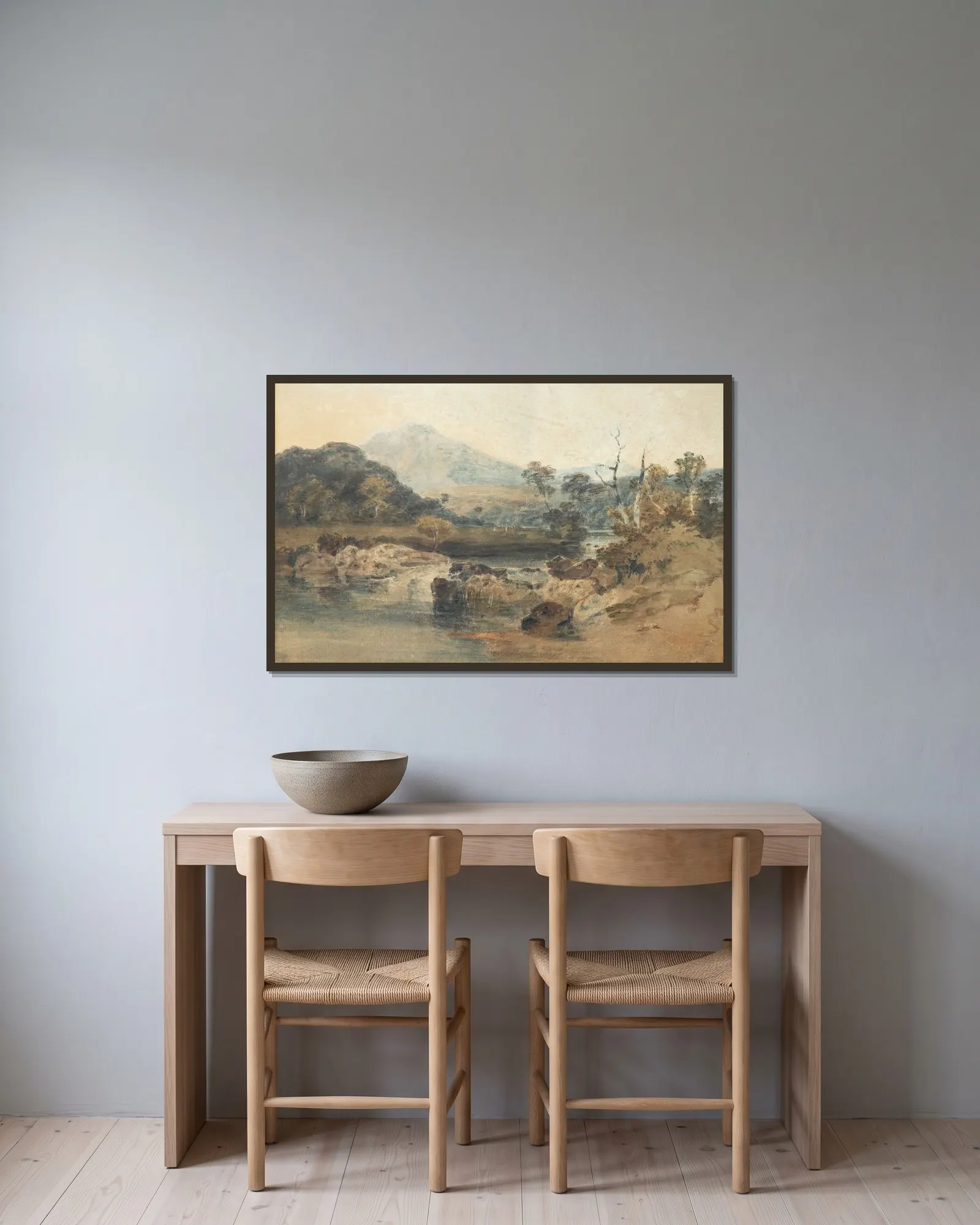 Snowdon from Beddgelert av Joseph Mallord William Turner inramad på en vägg