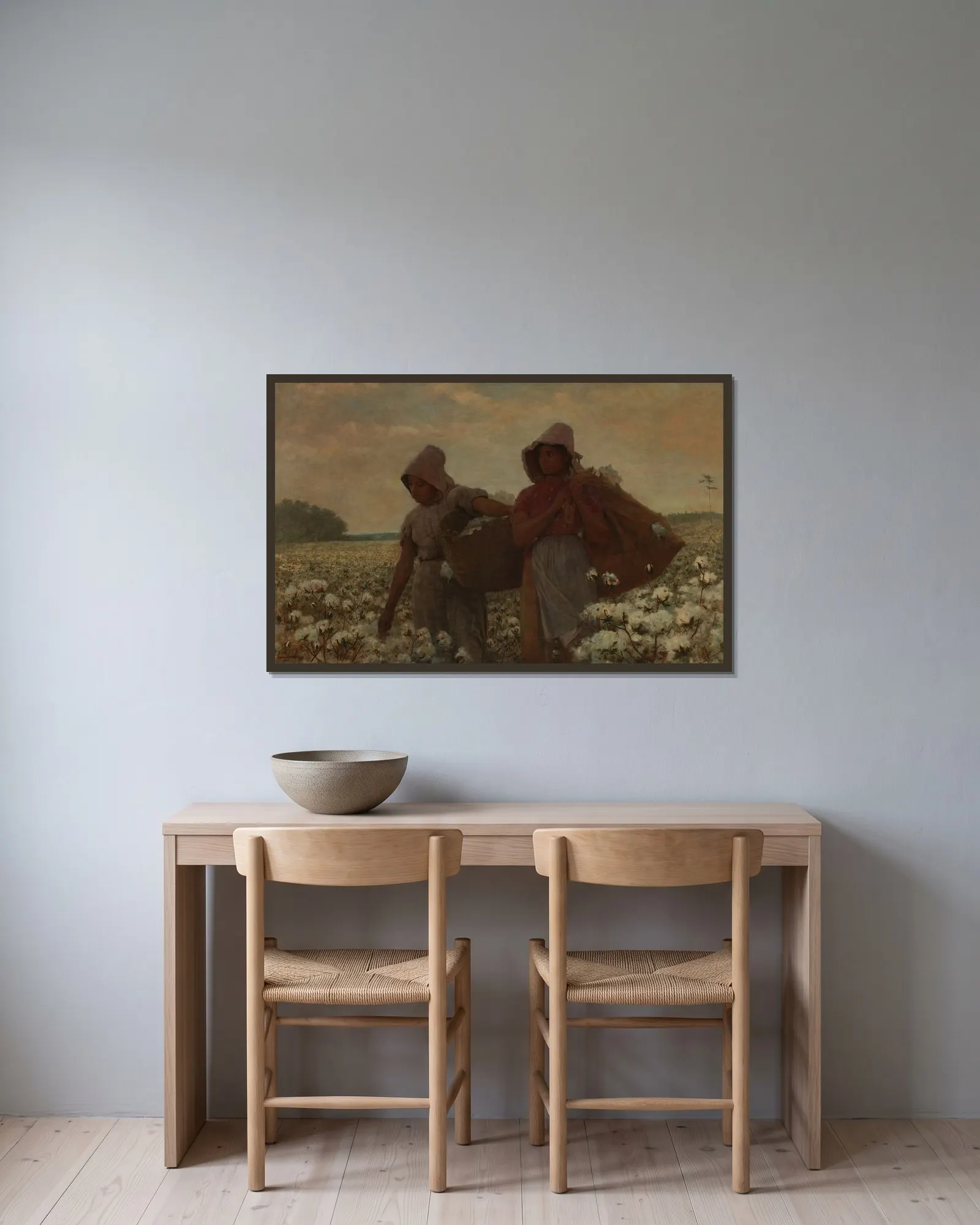 The Cotton Pickers av Winslow Homer inramad på en vägg