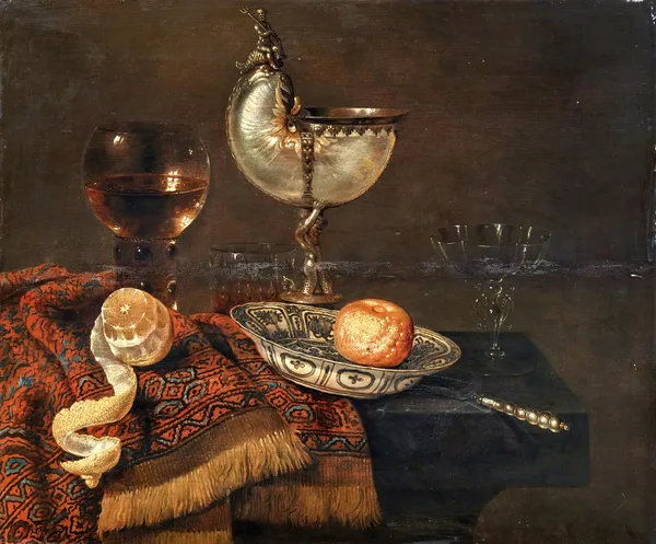 A clementine in a porcelain bowl, a nautilus cup, a roemer, two glasses, a knife, a peeled lemon on an ornamental carpet on a table av Willem Claesz Heda