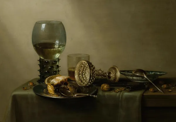 Dessert, still life with cake, wine, beer and nuts av Willem Claesz Heda