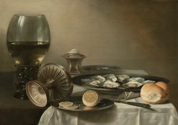 A large roemer, overturned tazza, salt cellar, partially sliced lemon, oysters, pepper, knife and bread on a partially draped table av Pieter Claesz