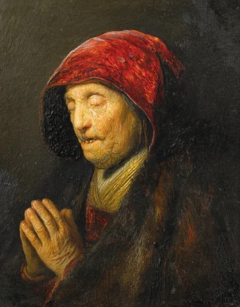 Old woman praying av Rembrandt van Rijn